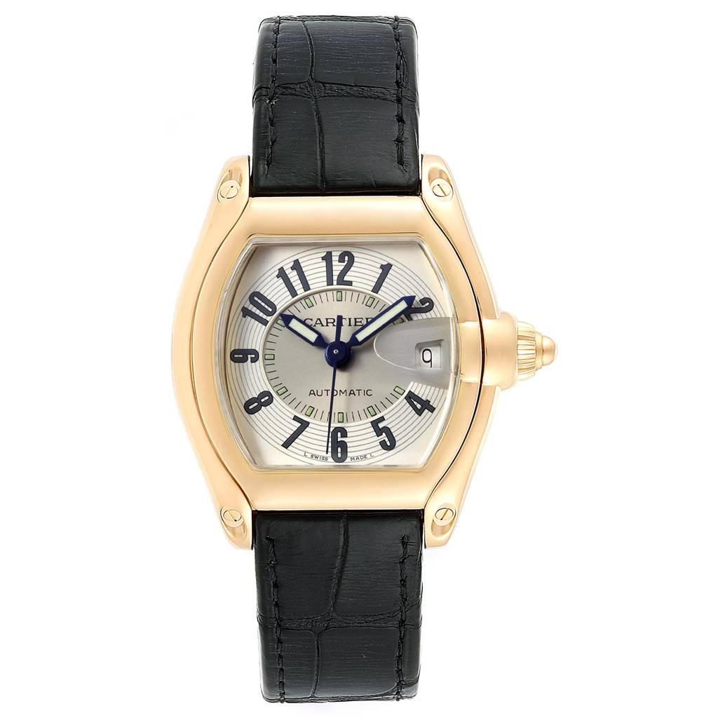 Cartier Roadster 18K Yellow Gold Large Mens Watch W62005V2. Automatic self-winding movement. 18K yellow gold tonneau shaped case 37 x 44 mm. Scratch resistant sapphire crystal with cyclops magnifying glass. Silver sunray effect dial with black