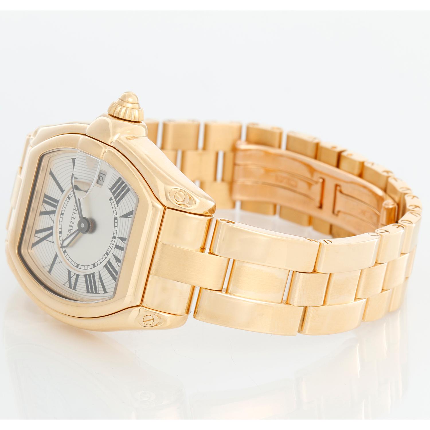 Cartier Roadster 18k Yellow Gold Quartz W620W62018Y18V1 2676 - Quartz. 18k yellow gold tonneau style case (31mm x 37mm). Silver guilloche dial with black Roman numerals; date at 3 o'clock. 18k yellow gold Cartier bracelet with deployant clasp.