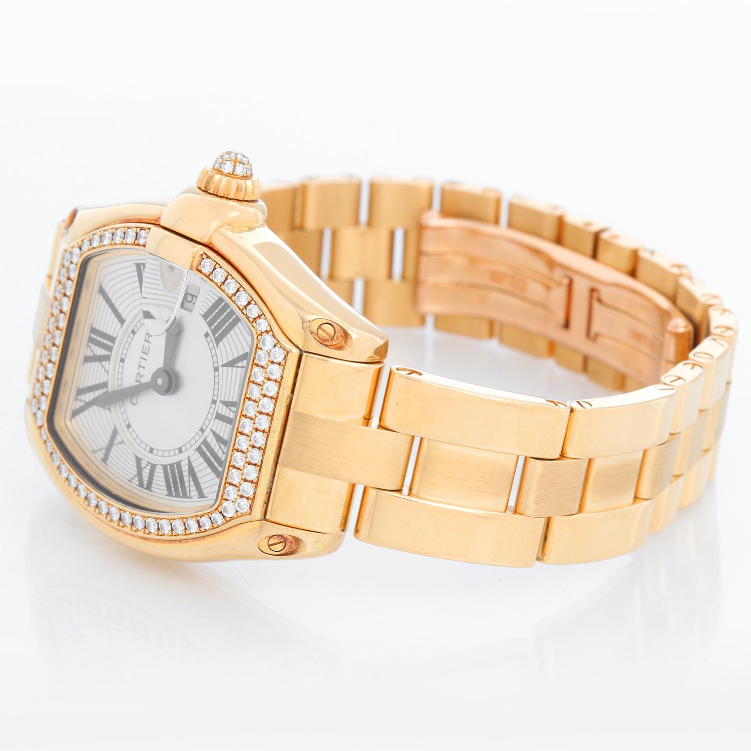 Cartier Roadster 18k Yellow Gold Quartz WE5001X1 2676 - Quartz. 18k yellow gold tonneau style case with diamond bezel  (31mm x 37mm). Silver guilloche dial with black Roman numerals; date at 3 o'clock. 18k yellow gold Cartier bracelet with deployant