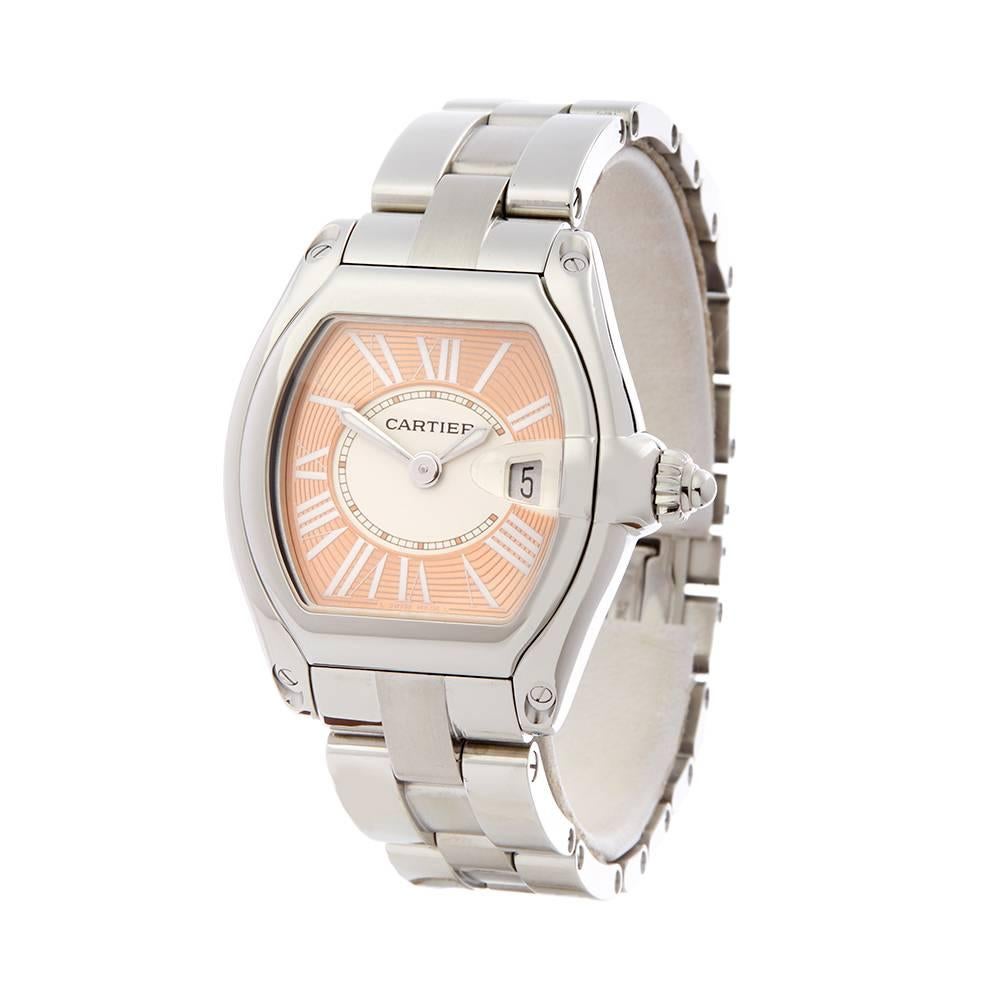 Ref: W5217
Manufacturer: Cartier
Model: Roadster
Model Ref: 2675
Age: 
Gender: Mens
Complete With: Box, Manuals & Guarantee
Dial: Pink Roman
Glass: Sapphire Crystal
Movement: Quartz
Water Resistance: To Manufacturers Specifications
Case: Stainless