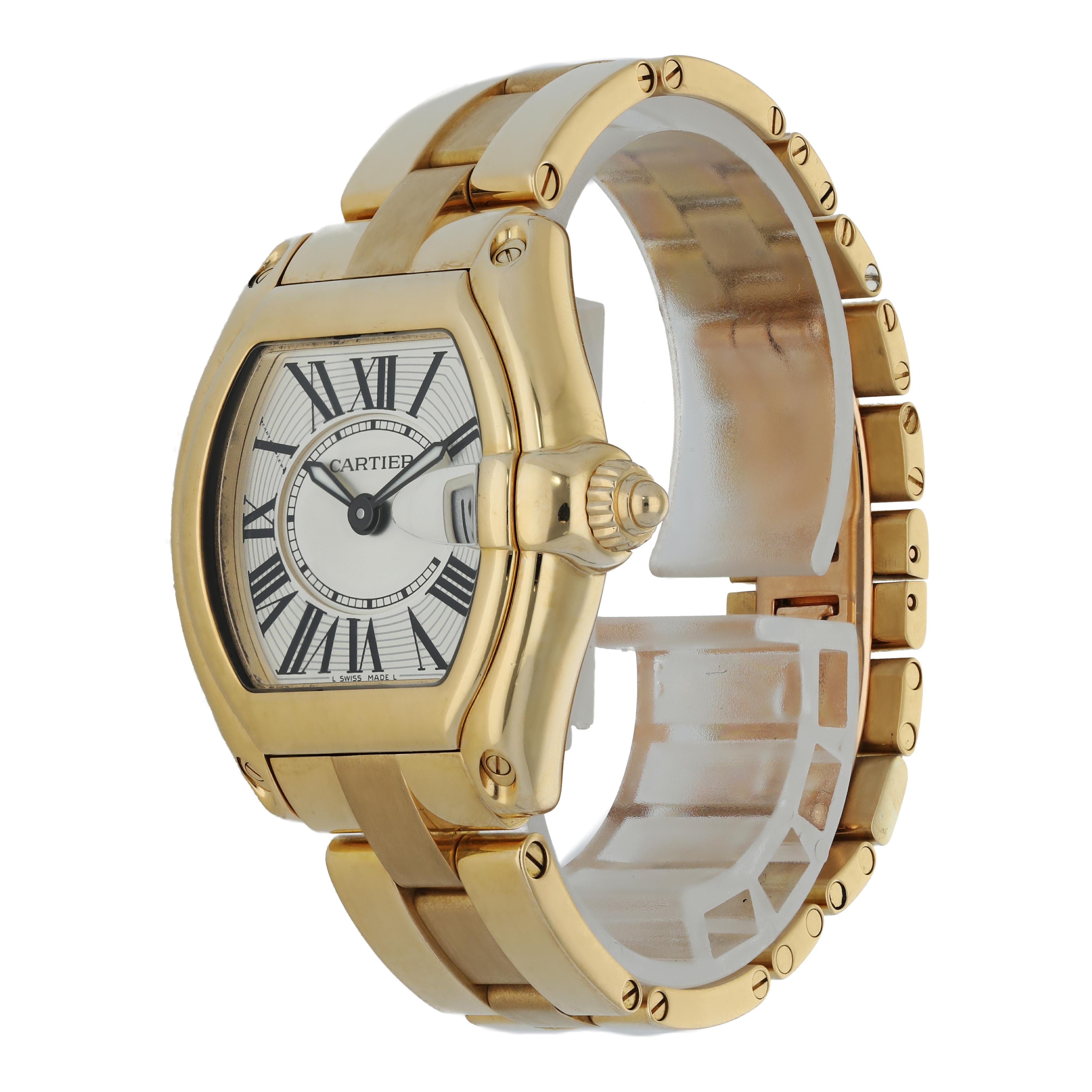Cartier Roadster 2676 Yellow Gold Ladies Watch.
30mm 18k Yellow gold case. 
Yellow Gold Stationary bezel. 
Silver dial with Luminous hands and black Roman numeral hour markers. 
Minute markers on the inner dial. 
Date display at the 3 o'clock