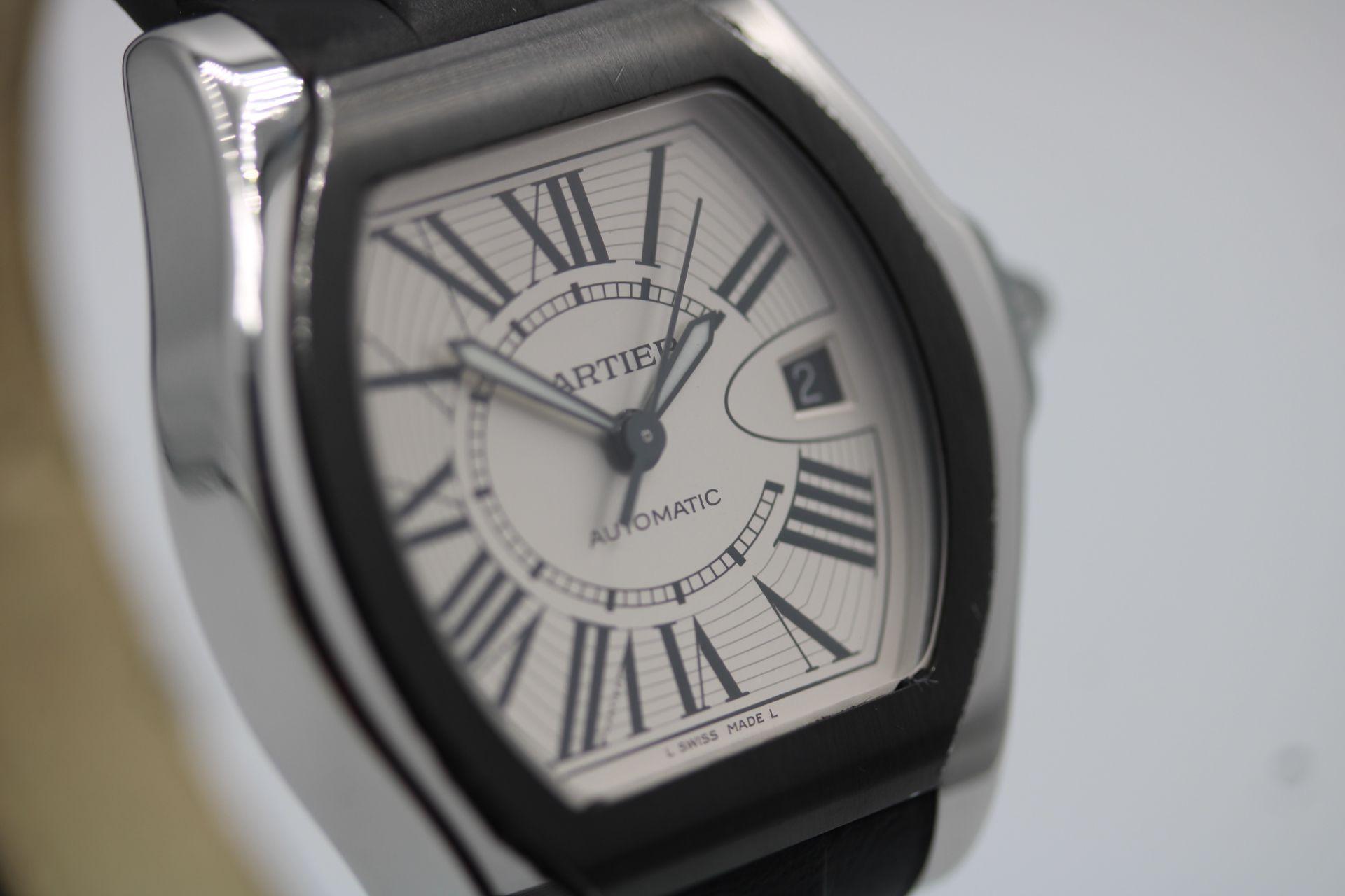 This Cartier Roadster is now discontinued, it is presented in excellent working order as well as condition, accompanied by its inner box, instruction manual, wallet and guarantee booklet dated June 2010.

The Cartier Roadster 3312, features a 40mm