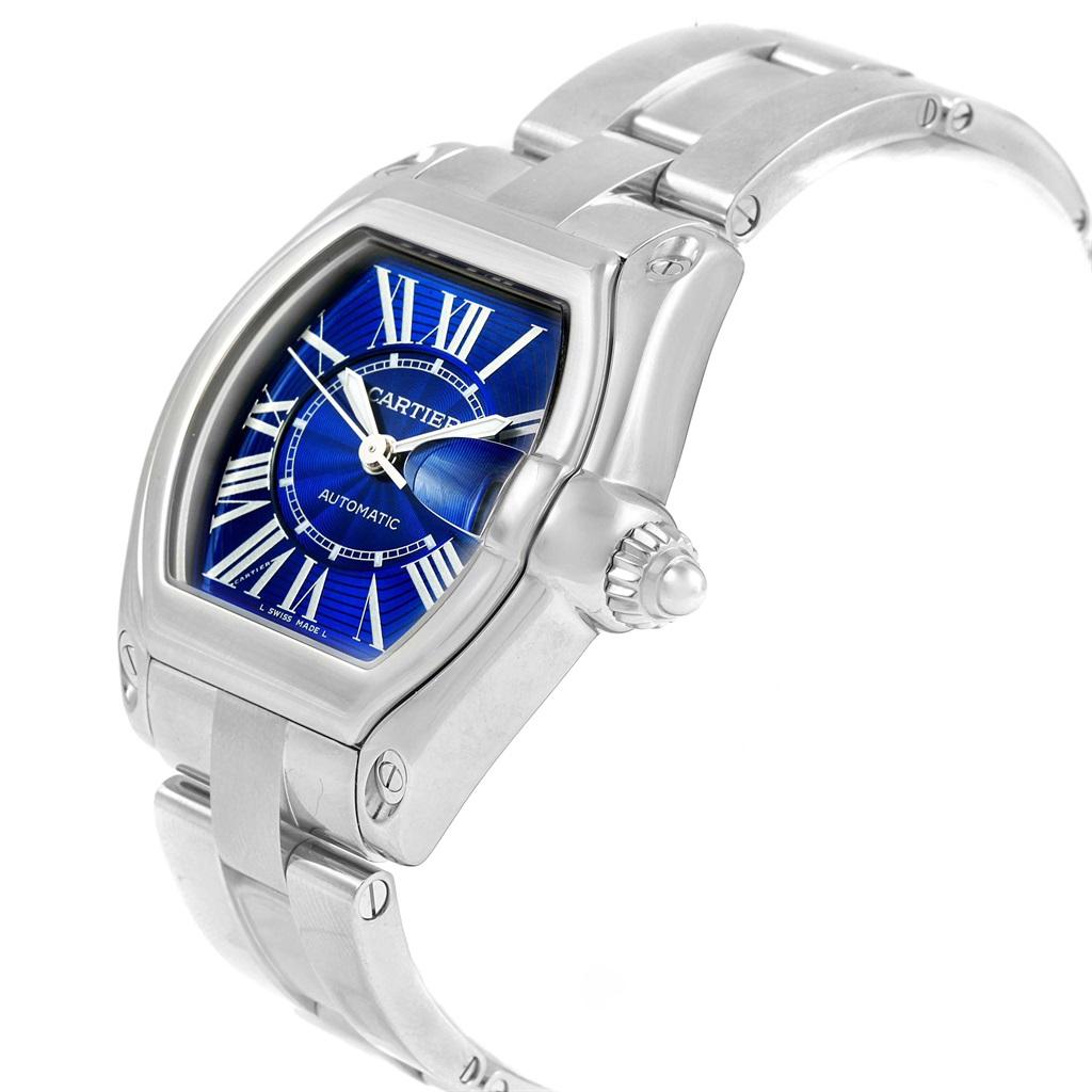 Cartier Roadster Blue Dial Steel Mens Watch W62048V3 Box Papers. Automatic self-winding movement. Highly polished stainless steel tonneau shaped case 38 x 43 mm. Scratch resistant sapphire crystal with cyclops magnifying glass. Blue sunray effect