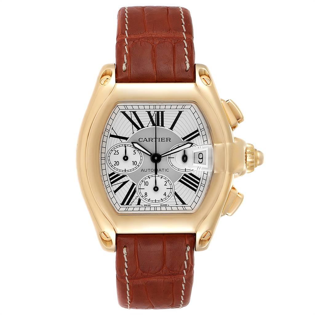 Cartier Roadster Brown Strap Yellow Gold Chronograph Mens Watch W62021Y3. Automatic self-winding movement with chronograph function. 18K yellow gold tonneau shaped case 47 x 43 mm. Scratch resistant sapphire crystal with cyclops magnifying glass.