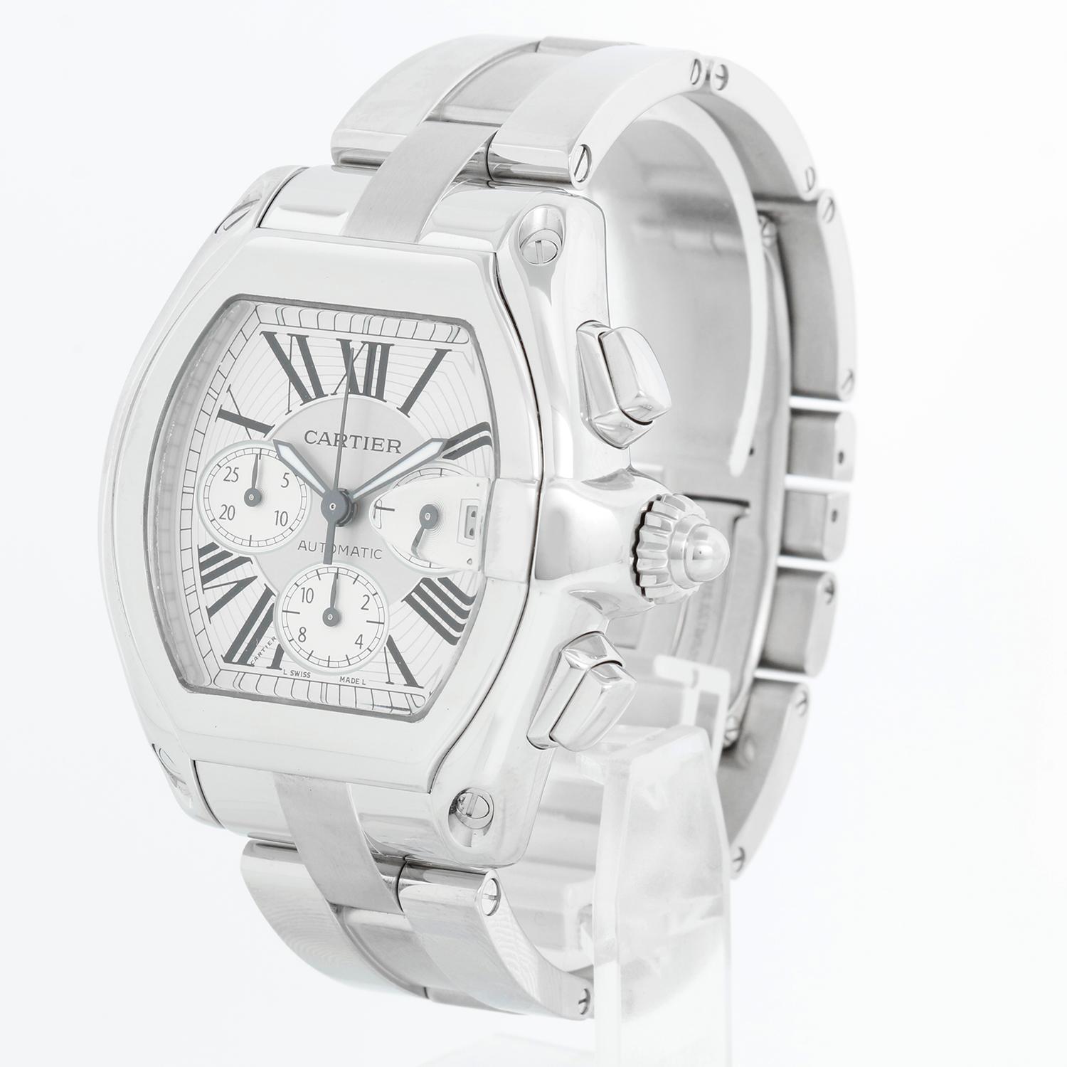 Cartier Roadster Chronograph Men's Stainless Steel Automatic Watch 2618 W62006X6 - Chronograph Automatic winding. Stainless steel case  (43mm x 48mm). Silver dial with Arabic numerals; date at 3 o'clock. Stainless steel Cartier Roadster bracelet