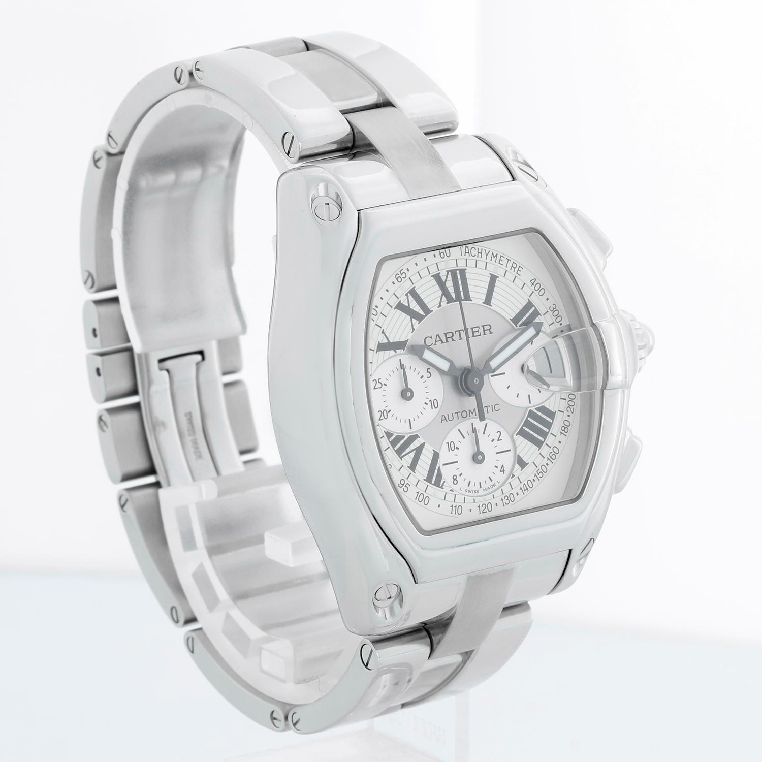 Cartier Roadster Chronograph Men's Stainless Steel Automatic Watch 2618 W62006X6 - Chronograph Automatic winding. Stainless steel case  (43mm x 48mm). Silver dial with Arabic numerals; date at 3 o'clock. Stainless steel Cartier Roadster bracelet