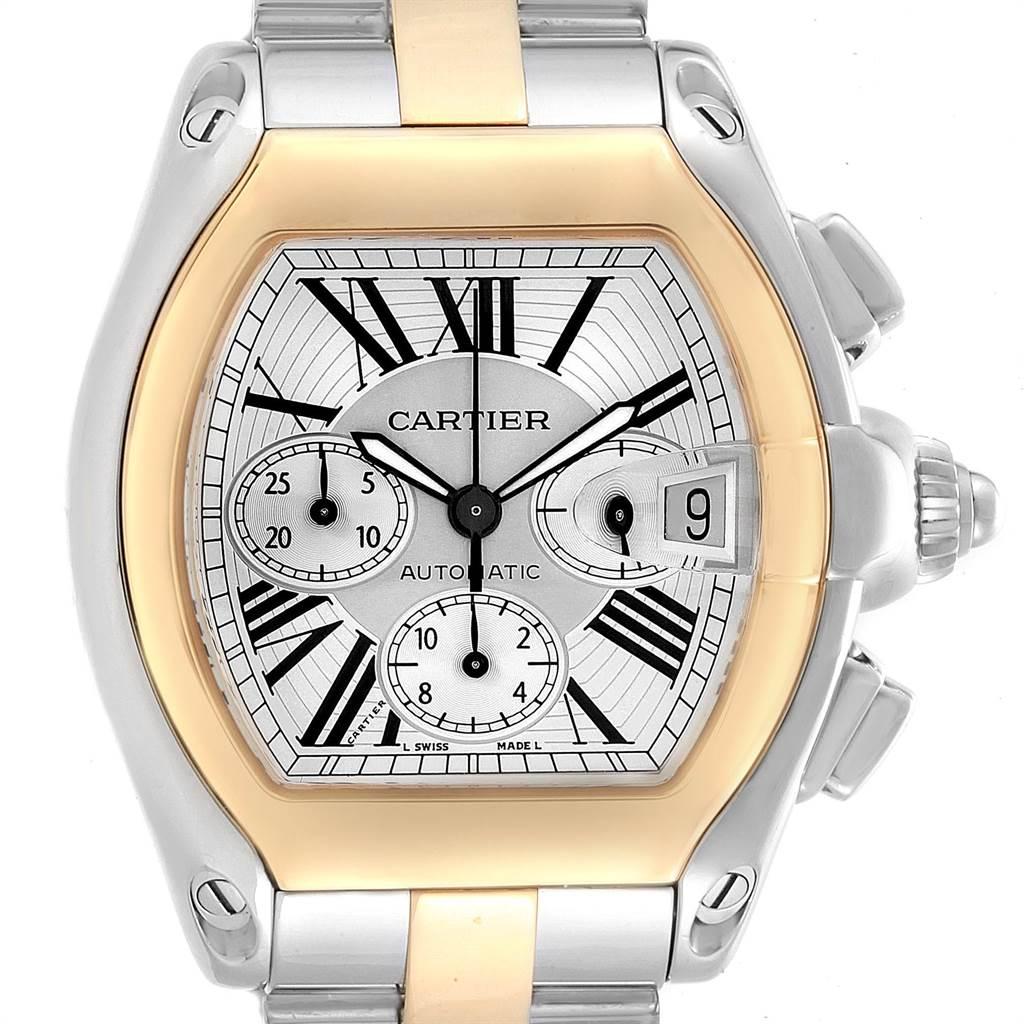 Cartier Roadster Chronograph Mens Steel Yellow Gold Watch W62027Z1. Automatic self-winding movement with chronograph function. Stainless steel and 18K yellow gold tonneau shaped case 48 x 43 mm. Scratch resistant sapphire crystal with cyclops