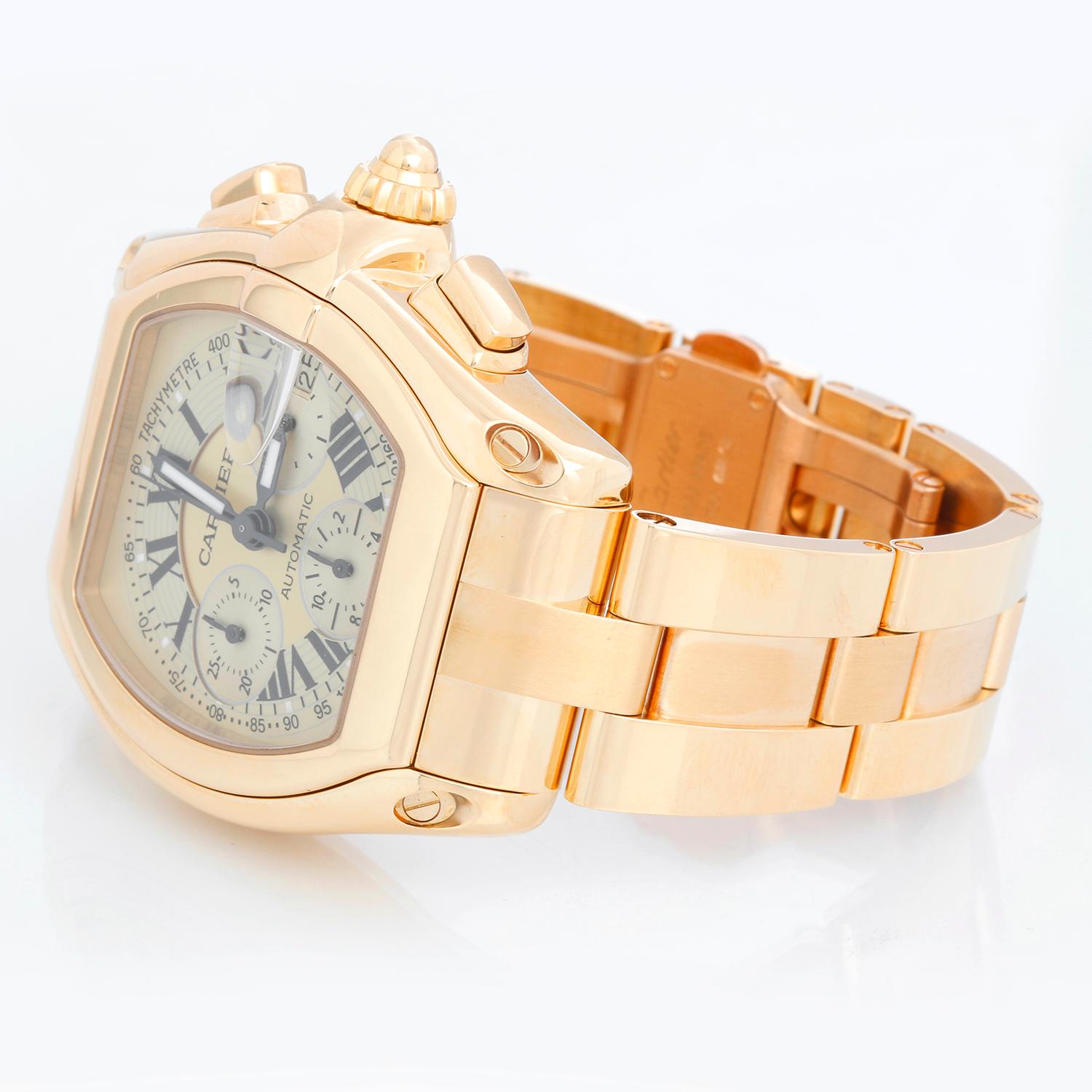 Cartier Roadster Chronograph XL 18k Yellow Gold Men's Watch 2619 - Automatic winding; chronograph with date. 18k yellow gold case (43 mm x 47mm). Champagne Dial with subdials. Cartier 18k yellow gold bracelet. Pre-owned with Cartier box and books.