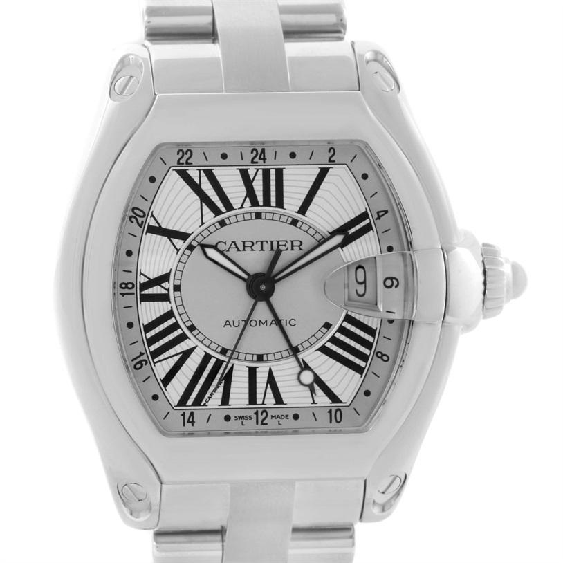 Cartier Roadster GMT Silver Dial Stainless Steel Mens Watch W62032X6. Automatic self-winding movement. Highly polished stainless steel tonneau shaped case 48 x 43 mm. Scratch resistant sapphire crystal with cyclops magnifying glass. Silver sunray