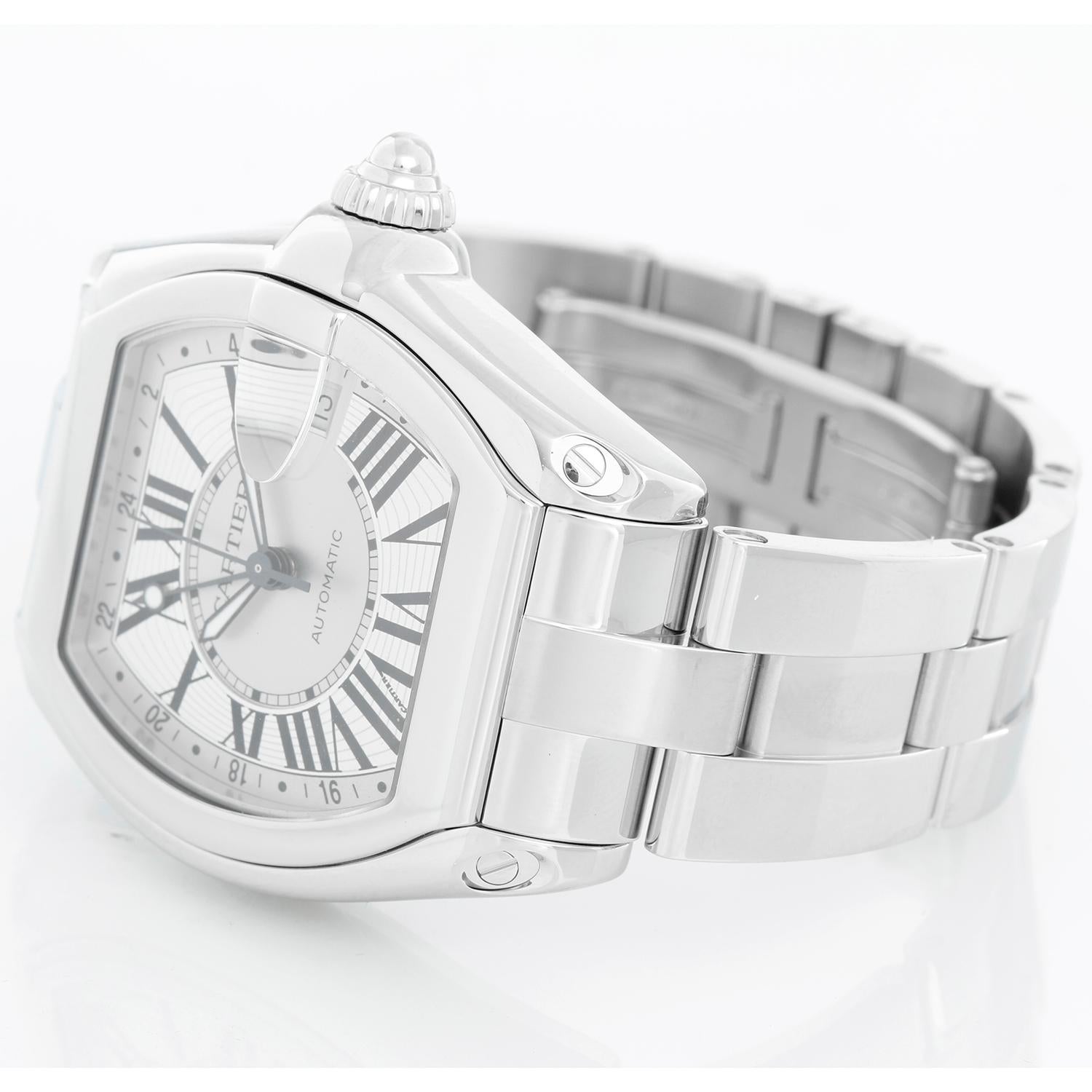 Cartier Roadster GMT Stainless Steel  XL Men's Watch Ref 2722 - Automatic winding with date and GMT features. Stainless steel case (39mm x 48mm). Silver dial with white Roman numerals; date at 3 o'clock. Stainless steel Cartier bracelet with