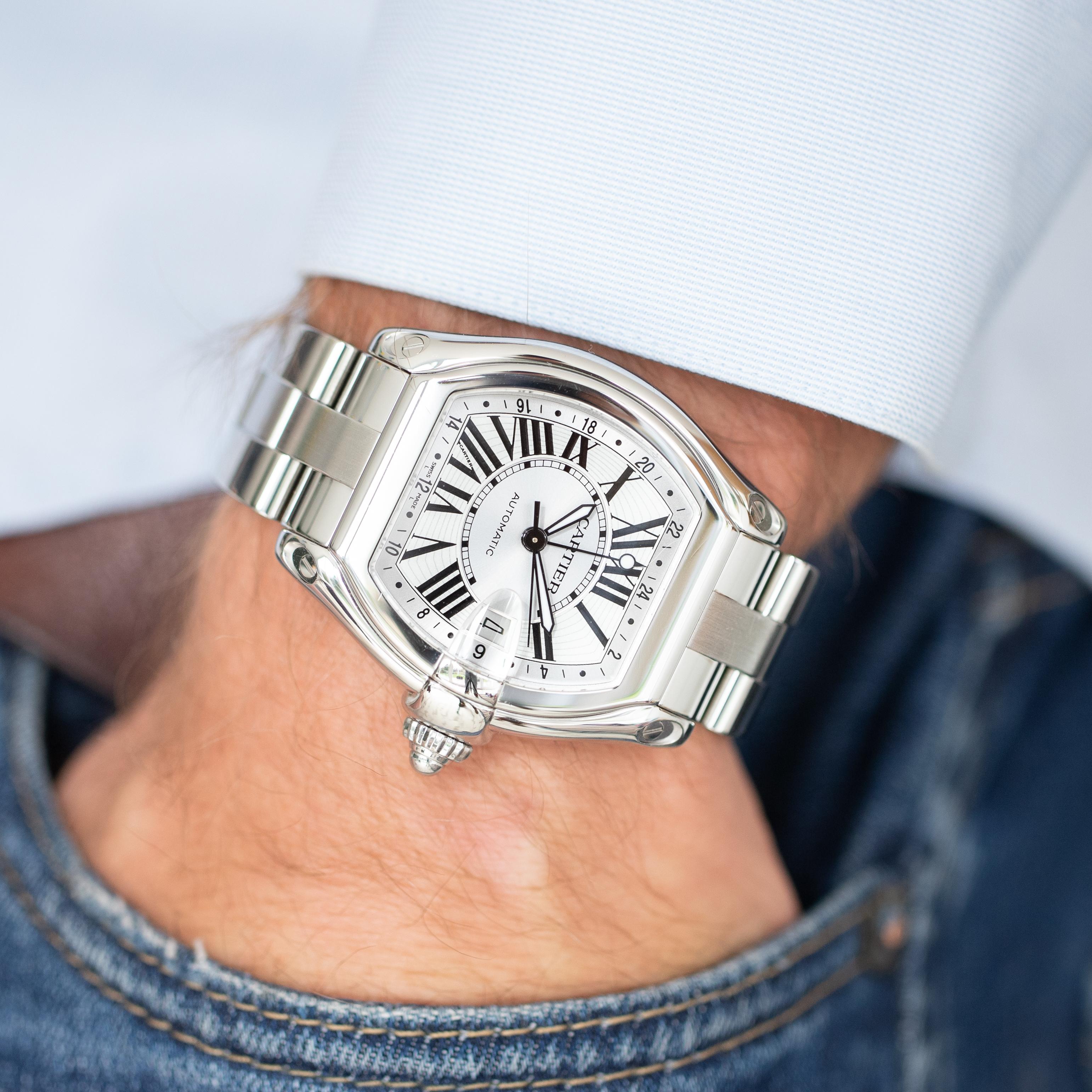 For sale is a very recognisable and stunningly eccentric timepiece: a Cartier Roadster GMT XL with reference number 2722. It dates back to the mid 2000s, featuring an intriguingly oversize tonneau shaped stainless steel case measuring 42mm wide and