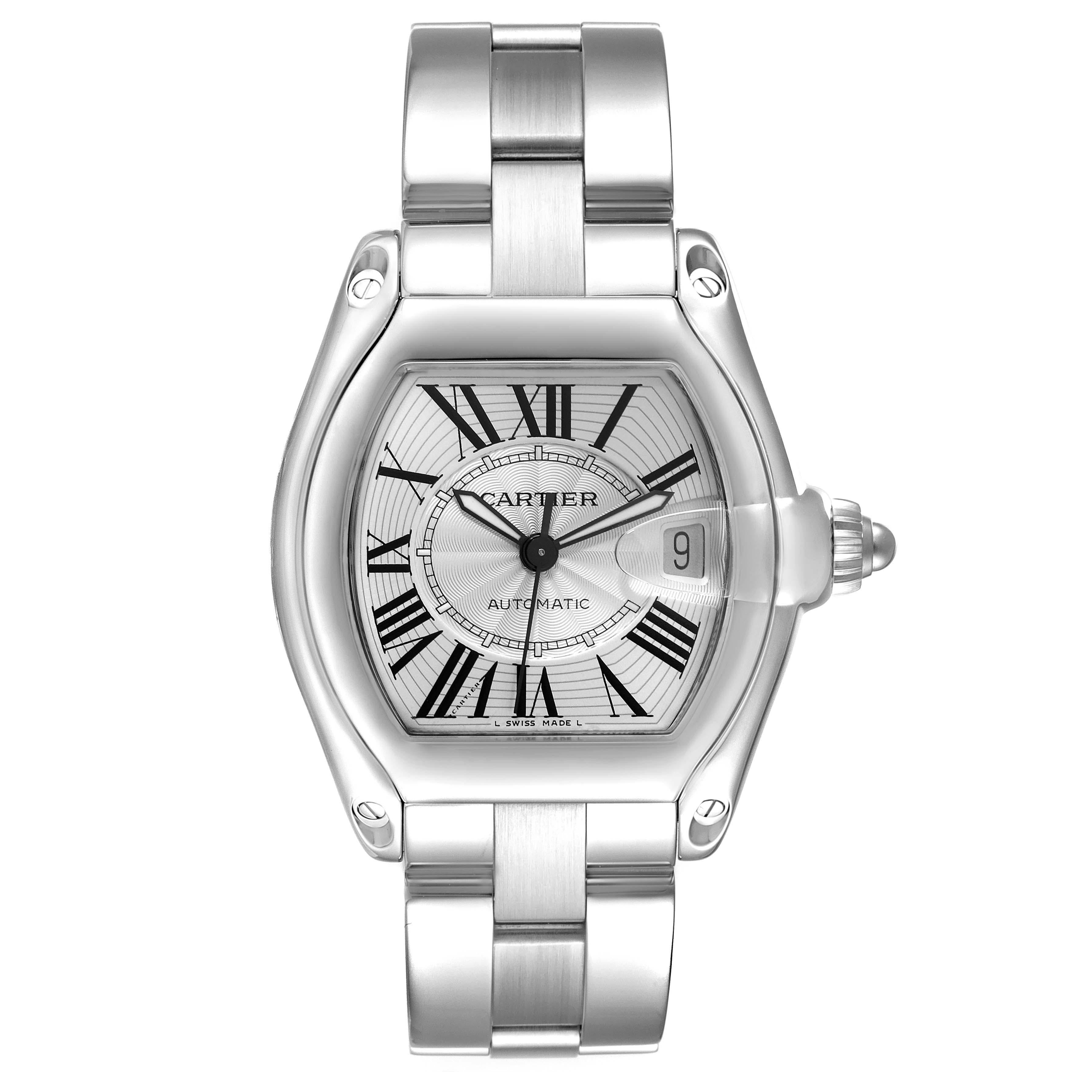 Cartier Roadster Large Silver Dial Steel Mens Watch W62025V3 Box Papers. Automatic self-winding movement. Stainless steel tonneau shaped case 38 x 43 mm. . Scratch resistant sapphire crystal with cyclops magnifying glass. Silver dial with black