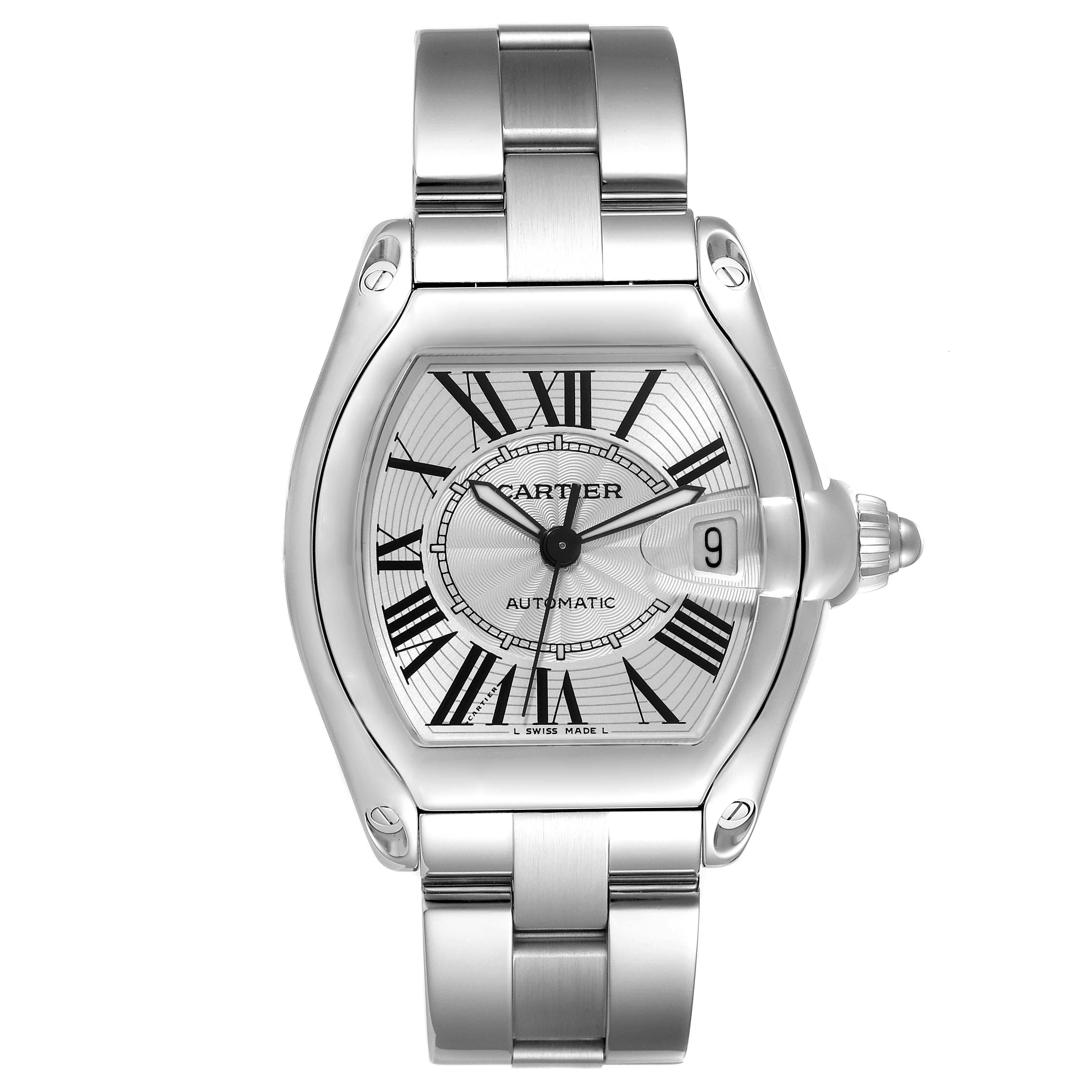 Cartier Roadster Large Silver Dial Steel Mens Watch W62025V3. Automatic self-winding movement. Stainless steel tonneau shaped case 38 x 43 mm. . Scratch resistant sapphire crystal with cyclops magnifying glass. Silver dial with black Roman numerals.