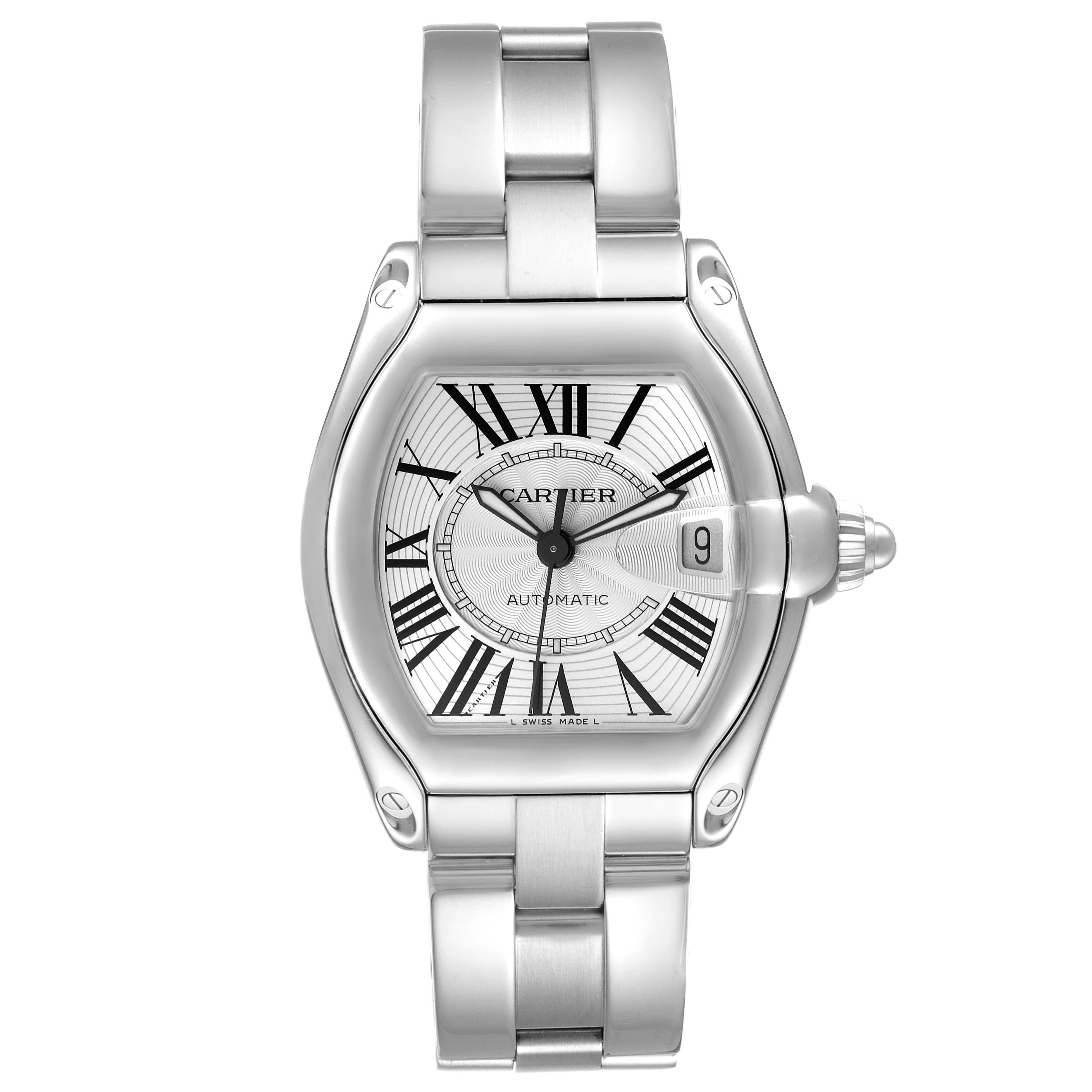 Cartier Roadster Large Silver Dial Steel Mens Watch W62025V3. Automatic self-winding movement. Stainless steel tonneau shaped case 38 x 43 mm. . Scratch resistant sapphire crystal with cyclops magnifying glass. Silver dial with black Roman numerals.