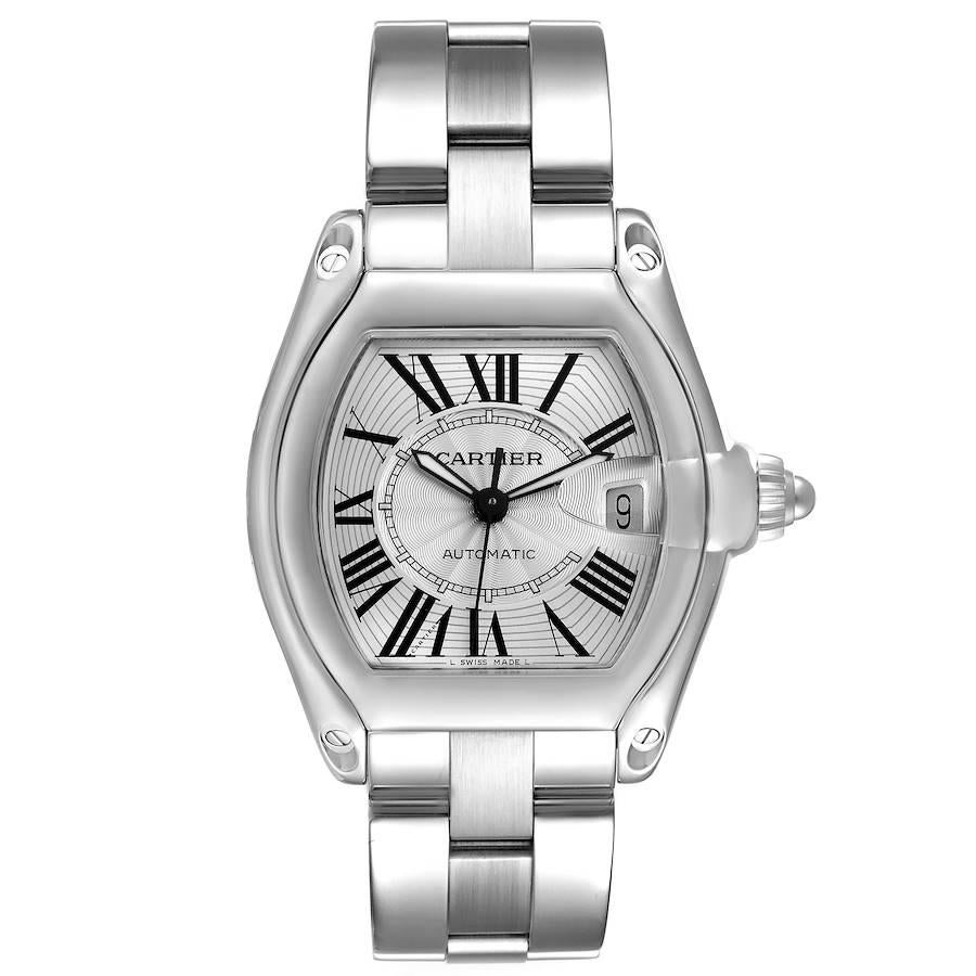 Cartier Roadster Large Silver Dial Steel Mens Watch W62025V3 Papers. Automatic self-winding movement. Stainless steel tonneau shaped case 38 x 43 mm. . Scratch resistant sapphire crystal with cyclops magnifying glass. Silver dial with black roman