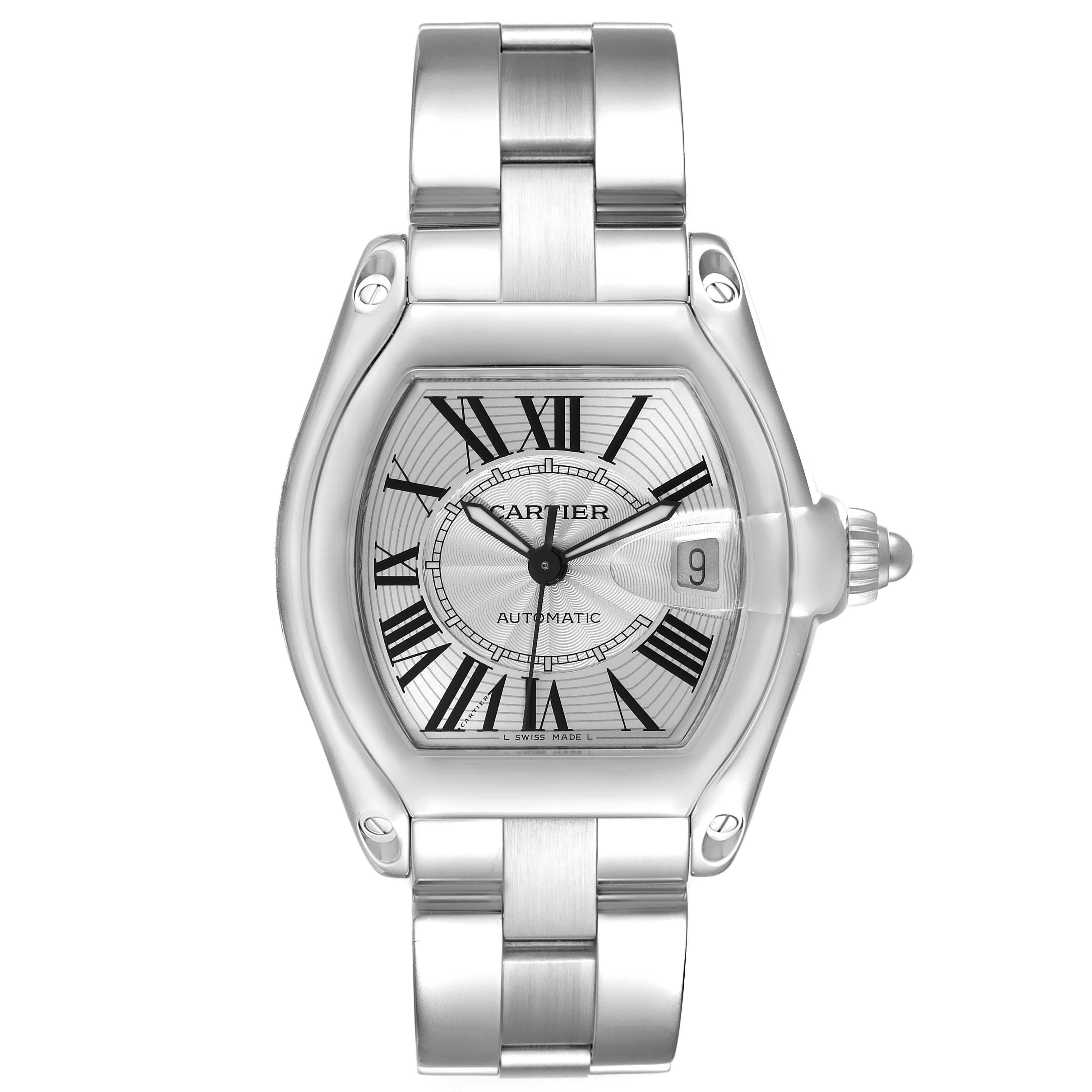 Cartier Roadster Large Silver Dial Steel Mens Watch W62025V3 Papers. Automatic self-winding movement. Stainless steel tonneau shaped case 38 x 43 mm. . Scratch resistant sapphire crystal with cyclops magnifying glass. Silver dial with black Roman