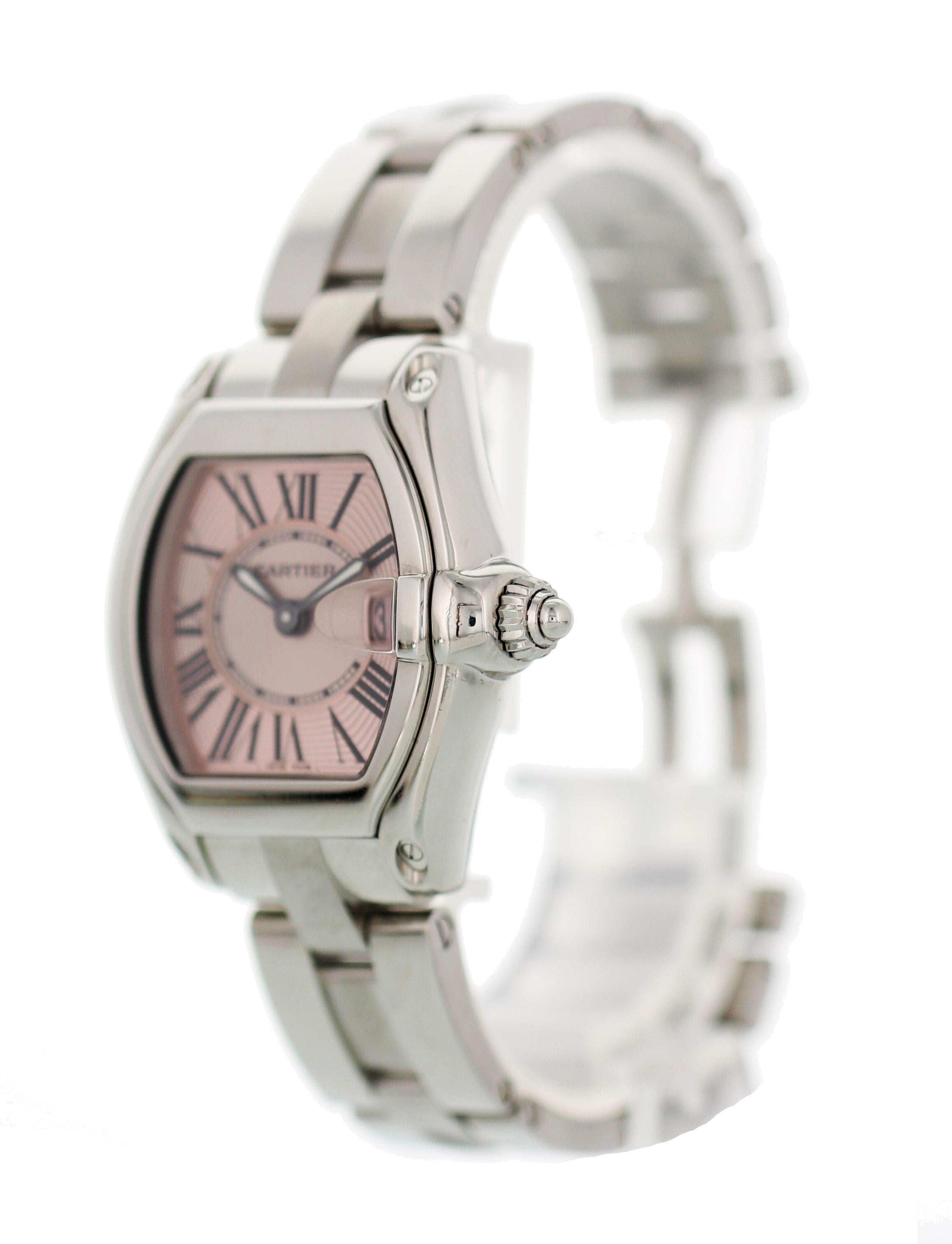 Ladies Cartier Roadster. 32 x 36 mm stainless steel case. Pink dial with luminous hands and black Roman numeral markers. Date display at the 3 o'clock. Stainless steel band with a hidden butterfly clasp. Quartz battery movement. Sapphire crystal