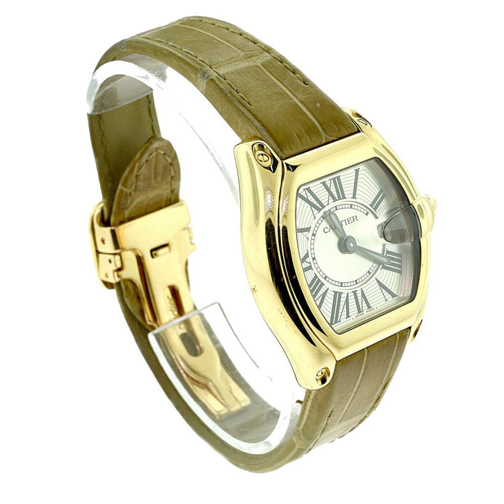 Brand: Cartier

Model Name: Roadster

Model Number: 2676

Ref. Number: W62018Y5

Movement: Quartz

Case Size: 30 mm x 35 mm

Case Material: 18k Yellow Gold

Braelet Material: 18k Yellow Gold

Bezel Material: 18k Yellow Gold  

Dial Type: Painted