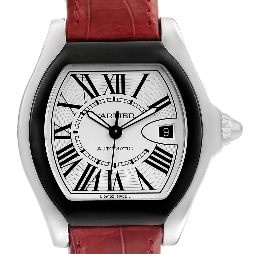 Cartier Roadster S Silver Dial Red Strap Steel Unisex Watch W6206018. Automatic self-winding movement. Stainless steel tonneau shaped case 46 x 45.6 mm. Fixed black ion-plated bezel. Scratch resistant sapphire crystal with cyclops magnifier. Silver