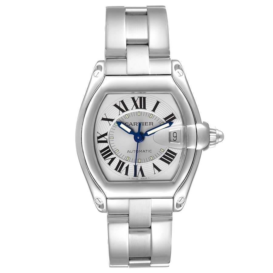 Cartier Roadster Silver Dial Steel Mens Watch W62000V3 Box Papers Strap. Automatic self-winding movement. Stainless steel tonneau shaped case 38 x 43mm. . Scratch resistant sapphire crystal with cyclops magnifying glass. Silver sunray dial with