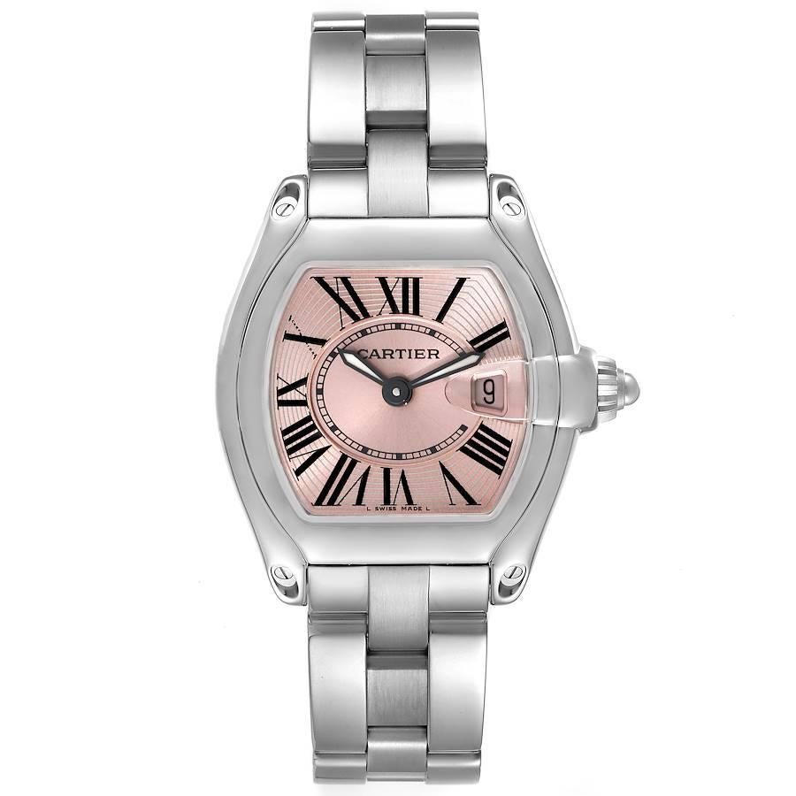 Cartier Roadster Small Pink Dial Steel Ladies Watch W62017V3. Swiss quartz movement calibre 688. Stainless steel tonneau shaped case 36 x 30 mm. . Scratch resistant sapphire crystal with cyclops magnifier. Pink sunray effect dial with black Roman