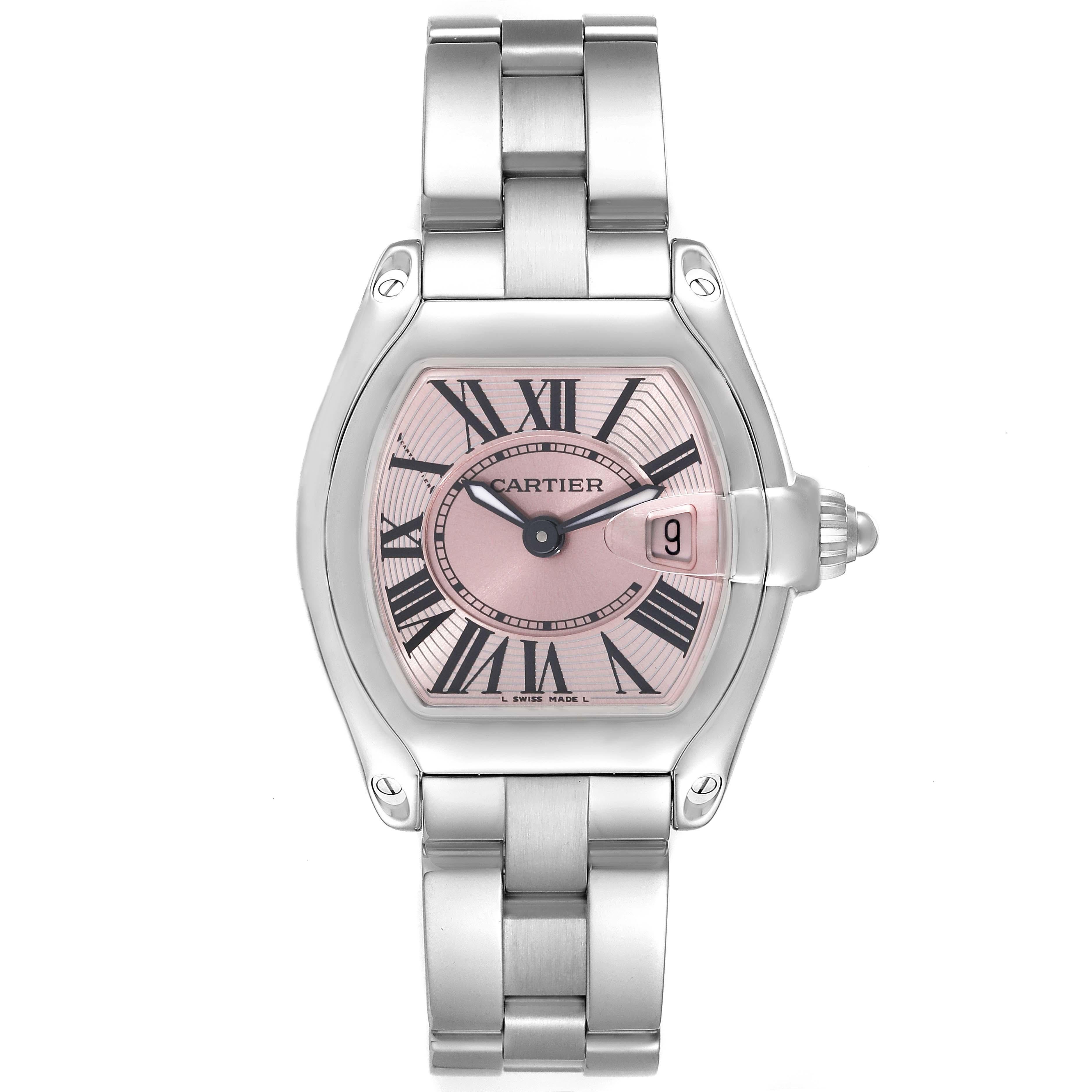 Cartier Roadster Small Pink Dial Steel Ladies Watch W62017V3. Swiss quartz movement calibre 688. Stainless steel tonneau shaped case 36 x 30 mm. . Scratch resistant sapphire crystal with cyclops magnifier. Pink sunray effect dial with black Roman