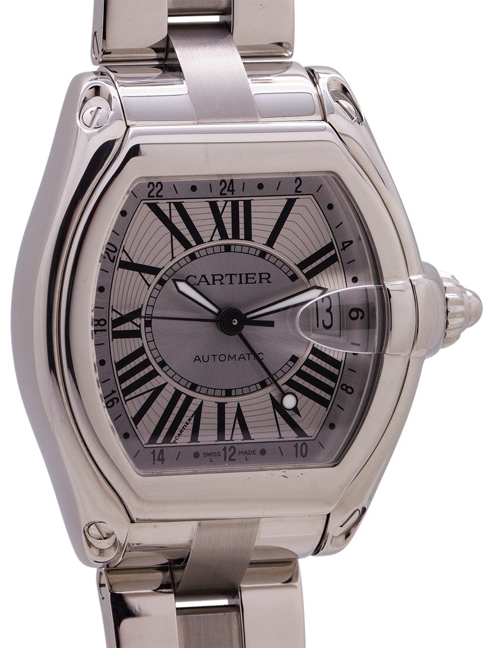 
Cartier Roadster Stainless Steel XL GMT model ref 2722 circa 2000s. Extra large size 41 x 48 mm tonneau shaped case with steel cabochon crown and sapphire crystal. Silver dial with black Roman numerals with luminous hands. Powered by self winding