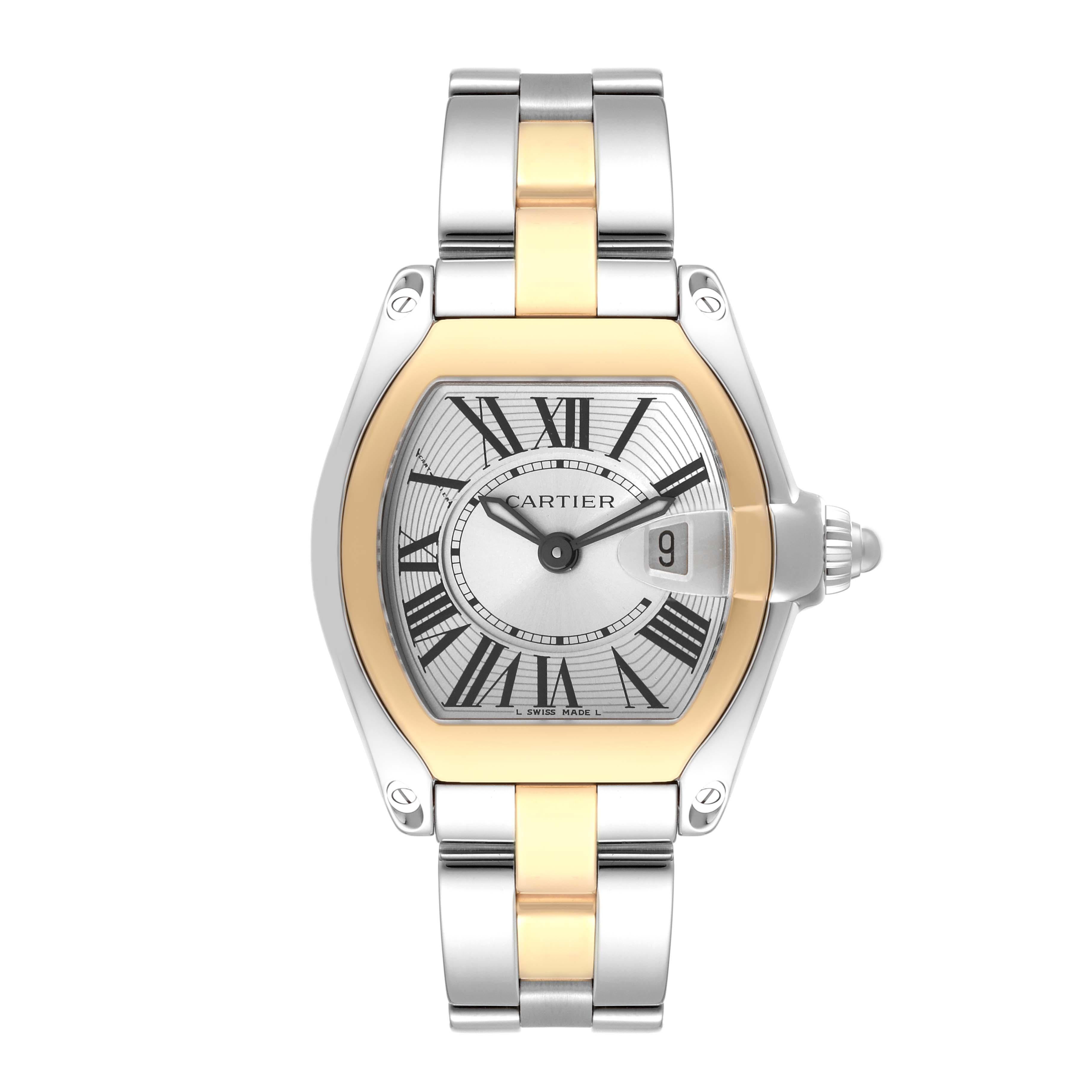 Cartier Roadster Steel Yellow Gold Ladies Watch W62026Y4. Swiss quartz movement. Calibre 688. Stainless steel and 18K yellow gold tonneau shaped case 36 x 30 mm. . Scratch resistant sapphire crystal with cyclops magnifying glass. Silver sunray