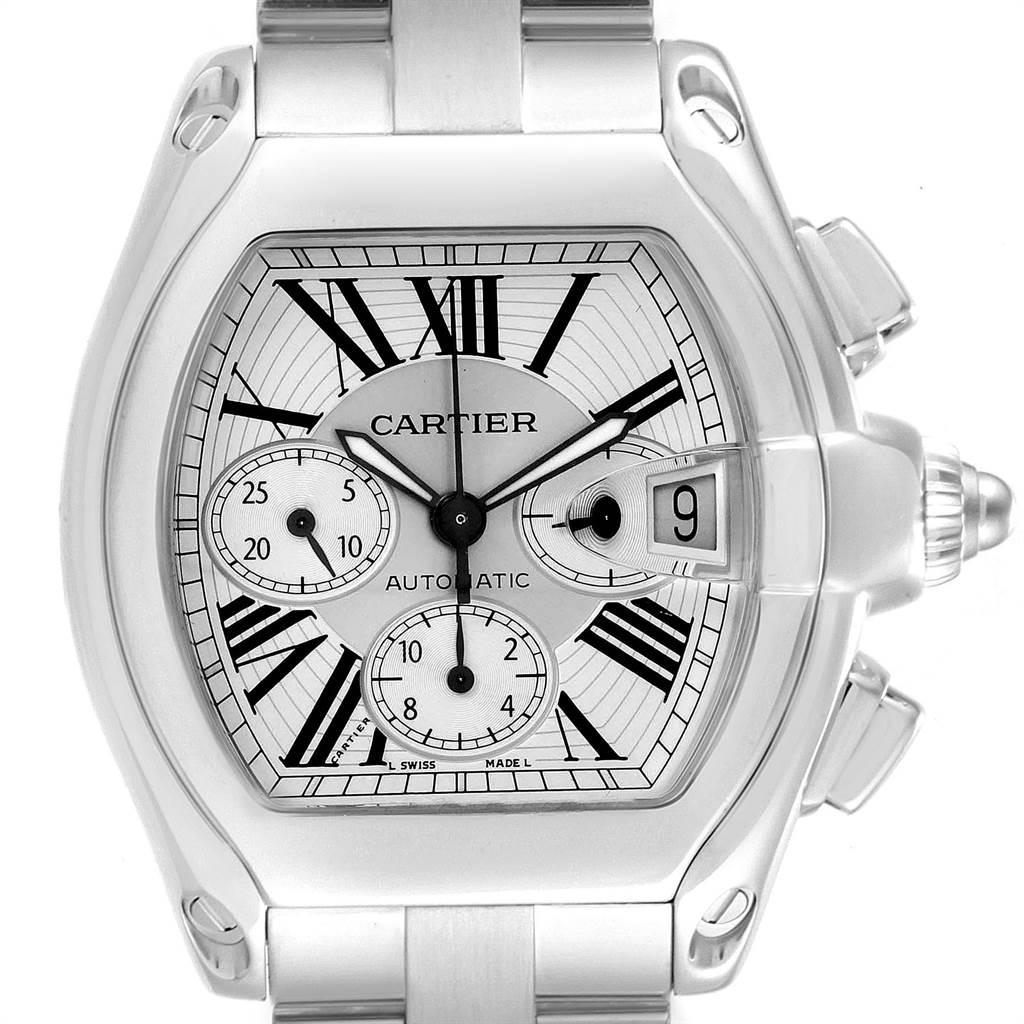 Cartier Roadster XL Chronograph Steel Mens Watch W62019X6 Box Papers. Automatic self-winding movement with chronograph function. Stainless steel tonneau shaped case 49 x 43mm. Scratch resistant sapphire crystal with cyclops magnifying glass. Silver