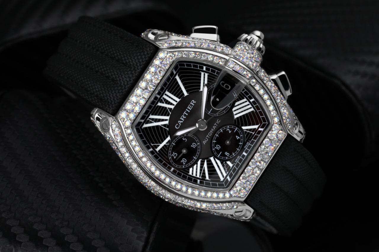 Cartier Roadster XL W62020X6 Chronograph watch. Black dial, 47.6mm x 42.8mm diamond, stainless steel case, on black alligator strap with diamond buckle.