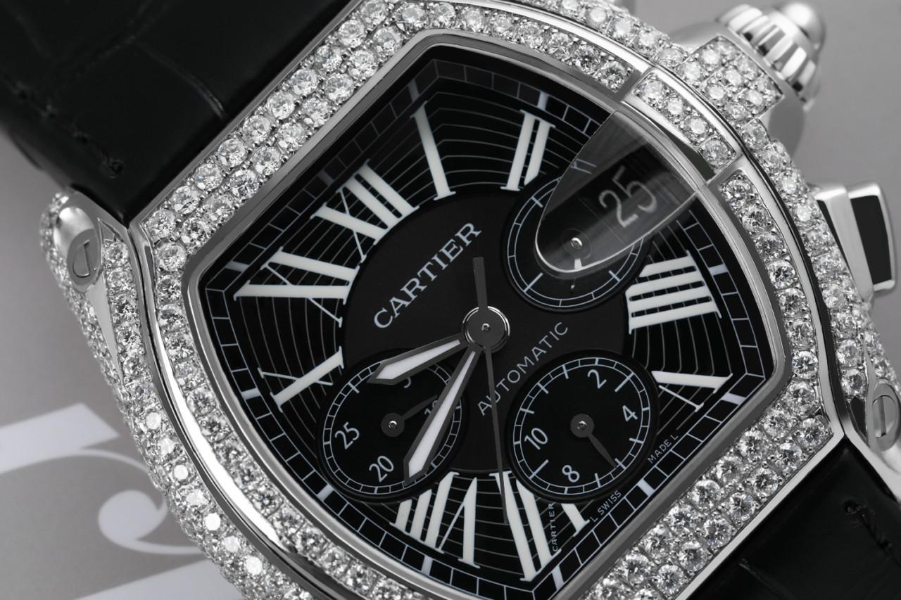 Cartier Roadster XL W62020X6 Chronograph watch. Black dial, 47.6mm x 42.8mm diamond, stainless steel case, on black alligator strap with diamond buckle. Will come included with stainless steel bracelet.