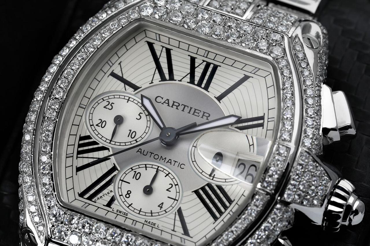 Cartier Roadster Xl W62020x6 Silver Dial Stainless Steel Custom Fully Iced Out Watch.

Stainless steel case back. Case dimensions: 49 mm x 43 mm. Case thickness: 13 mm. Hidden deployment clasp. Water resistant at 100 meters / 330 feet.