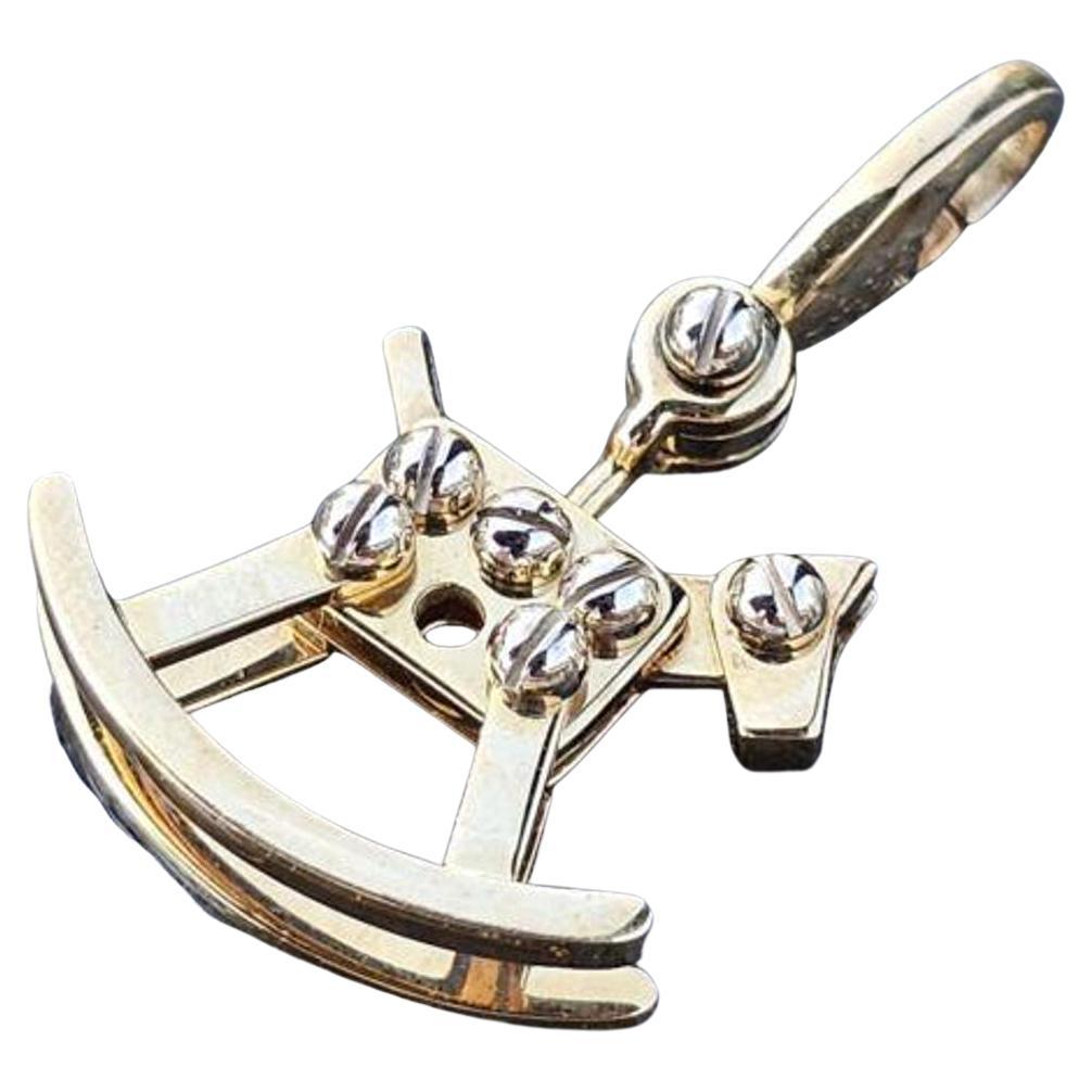 Add a touch of elegance to your charm bracelet with this Cartier Rocking Horse Charm Pendant. Crafted from 18k white and yellow gold, this pendant features a stunning charm design that is perfect for any occasion. The multi-tone gold gives it a