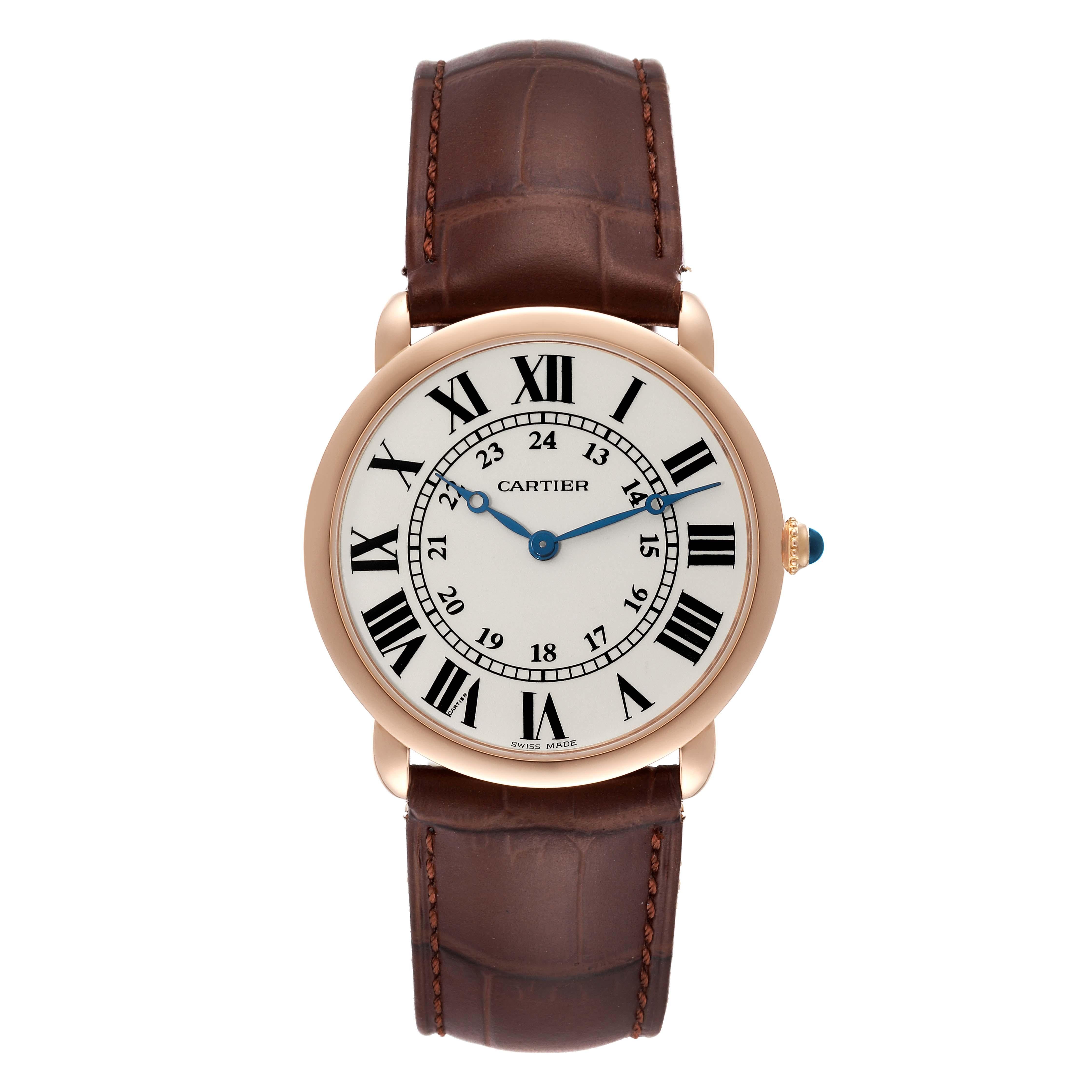 Cartier Ronde Louis Rose Gold Silver Dial Mens Watch W6800251. Manual winding movement. 18k rose gold case 36.0 mm in diameter. Exhibition transparent sapphire crystal caseback. Circular grained crown set with a blue sapphire cabochon. . Scratch