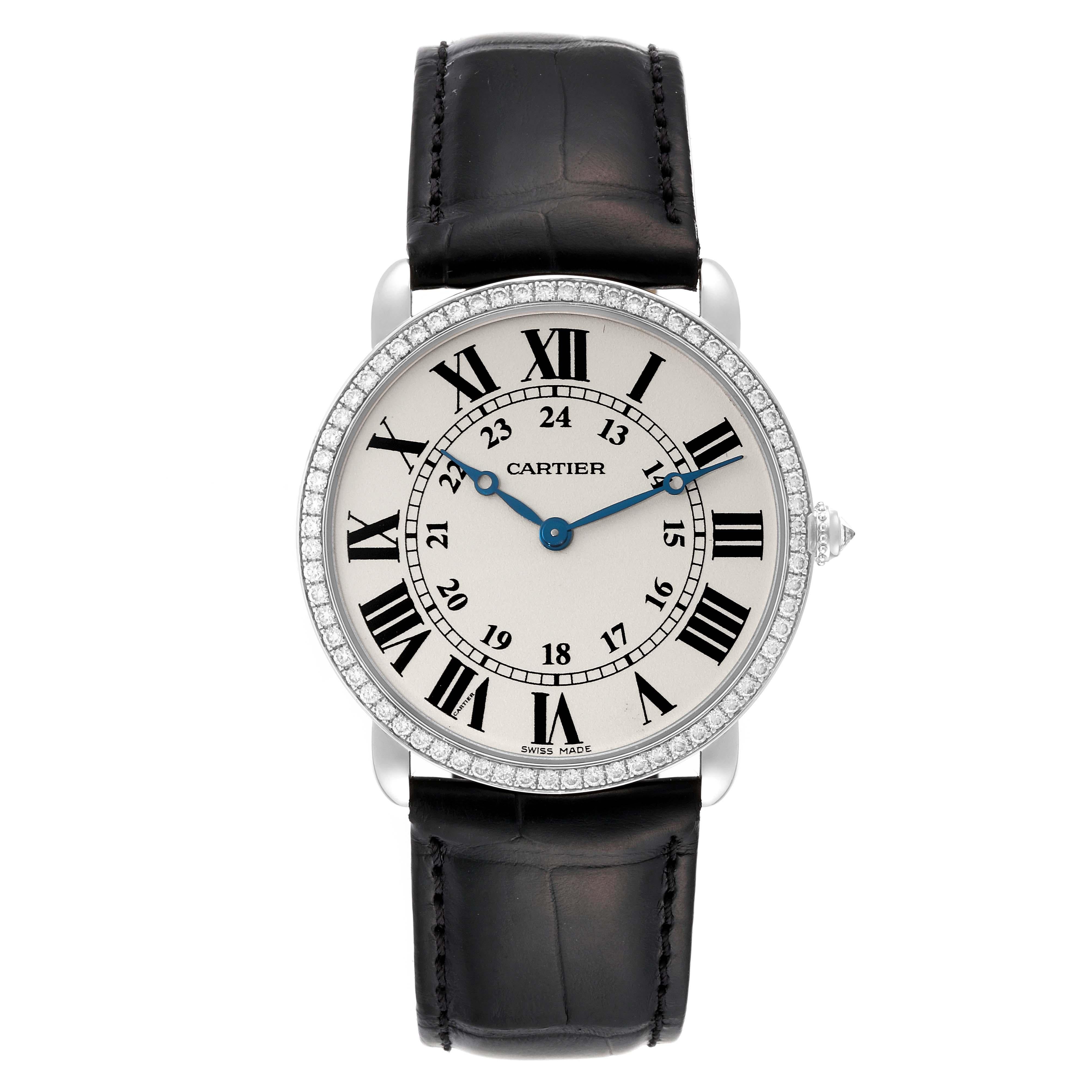 Cartier Ronde Louis White Gold Diamond Mens Watch WR000551 Box Card. Manual winding movement. 18k white gold case 36 mm in diameter. Circular grained crown set with an original Cartier factory diamond. Original Cartier factory diamond bezel. Scratch
