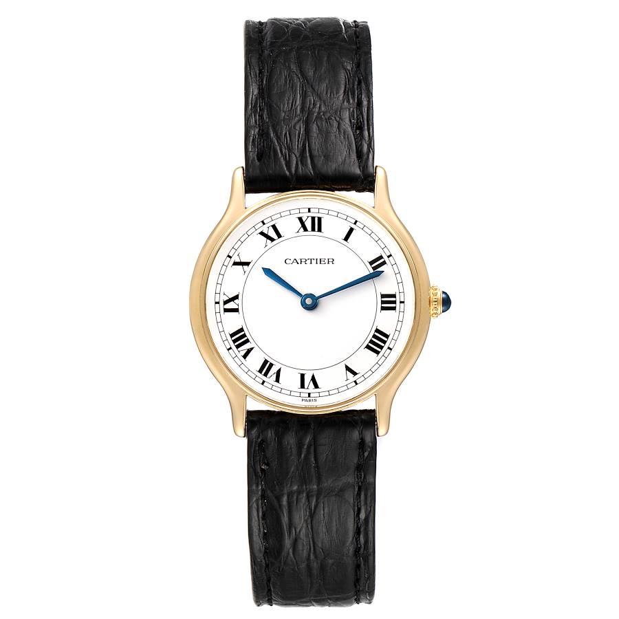Cartier Ronde Paris 18K Yellow Gold Ladies Vintage Watch. Manual winding movement. 18K yellow gold case 28.0 mm in diameter. Circular grained crown set with the blue spinel cabochon. . Scratch resistant sapphire crystal. Silvered opaline dial.