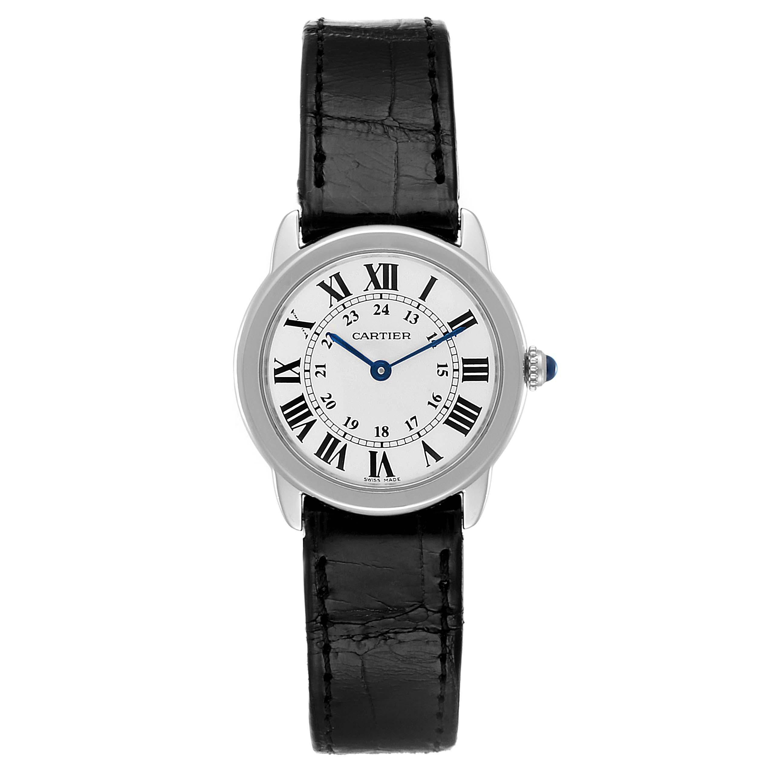 Cartier Ronde Solo Silver Dial Steel Ladies Watch W6700155. Quartz movement. Stainless steel case 29 mm in diameter. Circular grained crown set with the blue spinel cabochon. . Scratch resistant sapphire crystal. Silvered opaline dial. Painted black