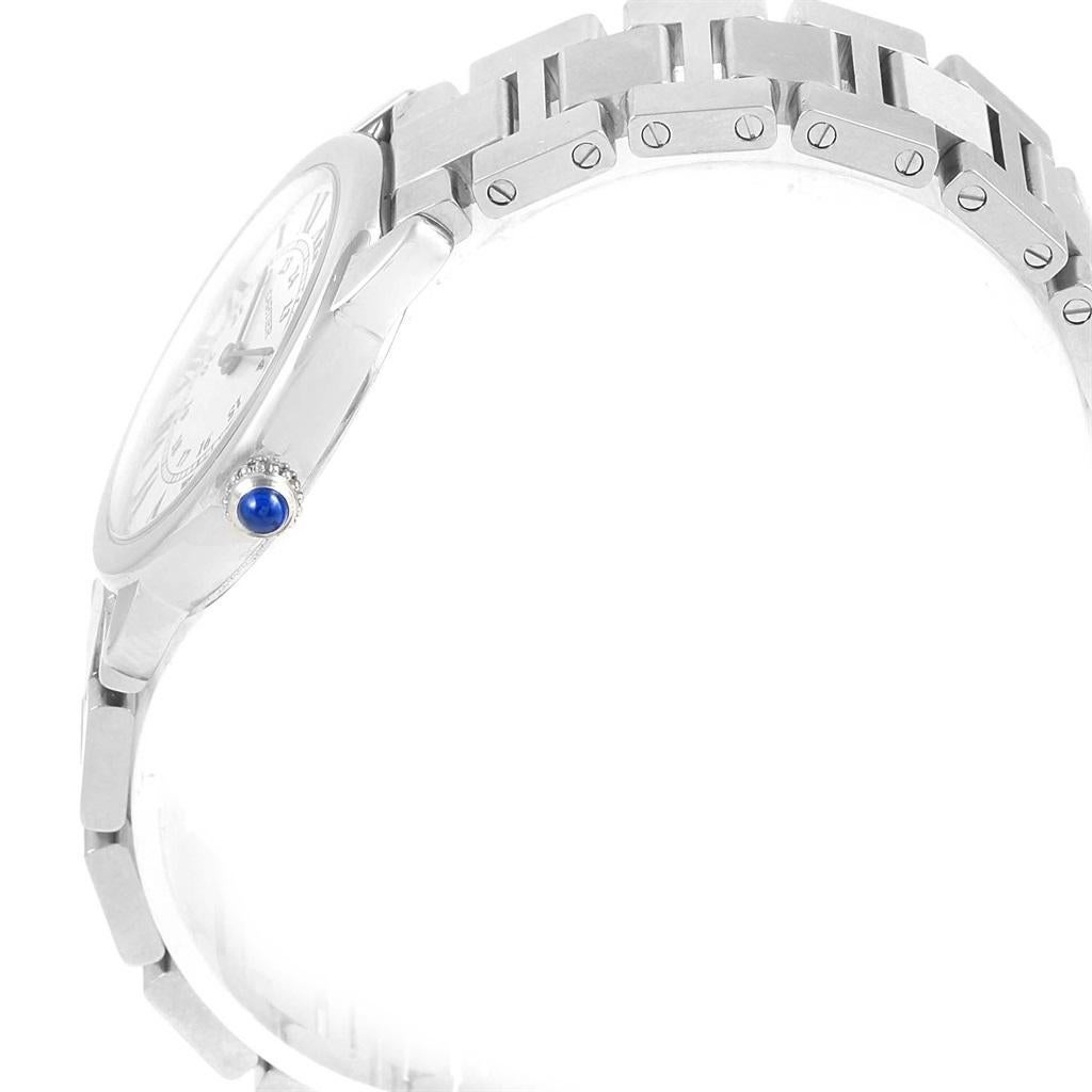Cartier Ronde Solo Stainless Steel Quartz Ladies Watch W6701004. Quartz movement. Stainless steel case 29 mm in diameter. Circular grained crown set with the blue spinel cabochon. Fixed stainless steel bezel. Scratch resistant sapphire crystal.