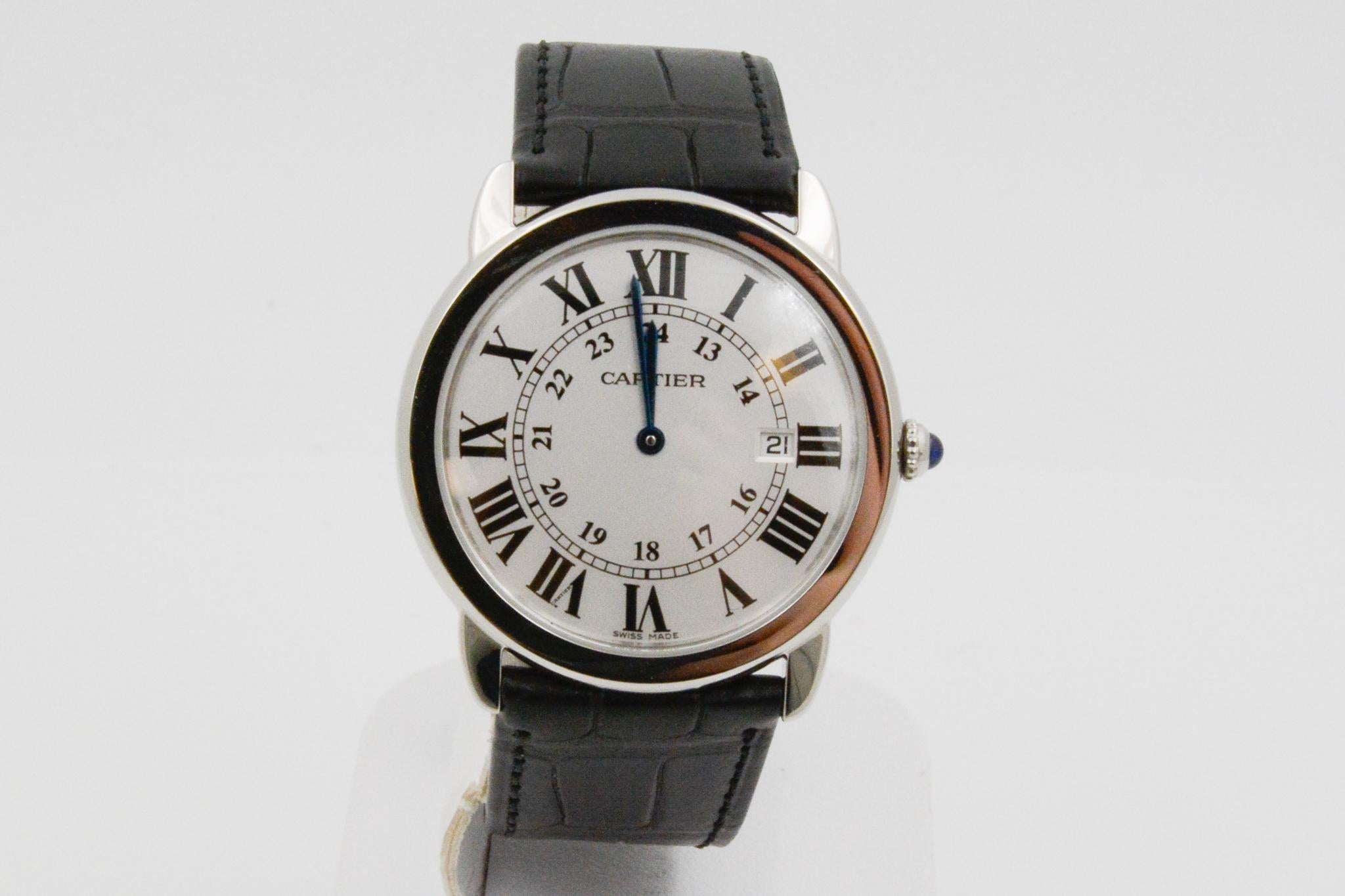 This circa 2012 CPO Cartier Ronde Solo 36mm timepiece has a steel silver roman quartz dial with sapphire crystal, quartz movement and a black strap. #W6700255
