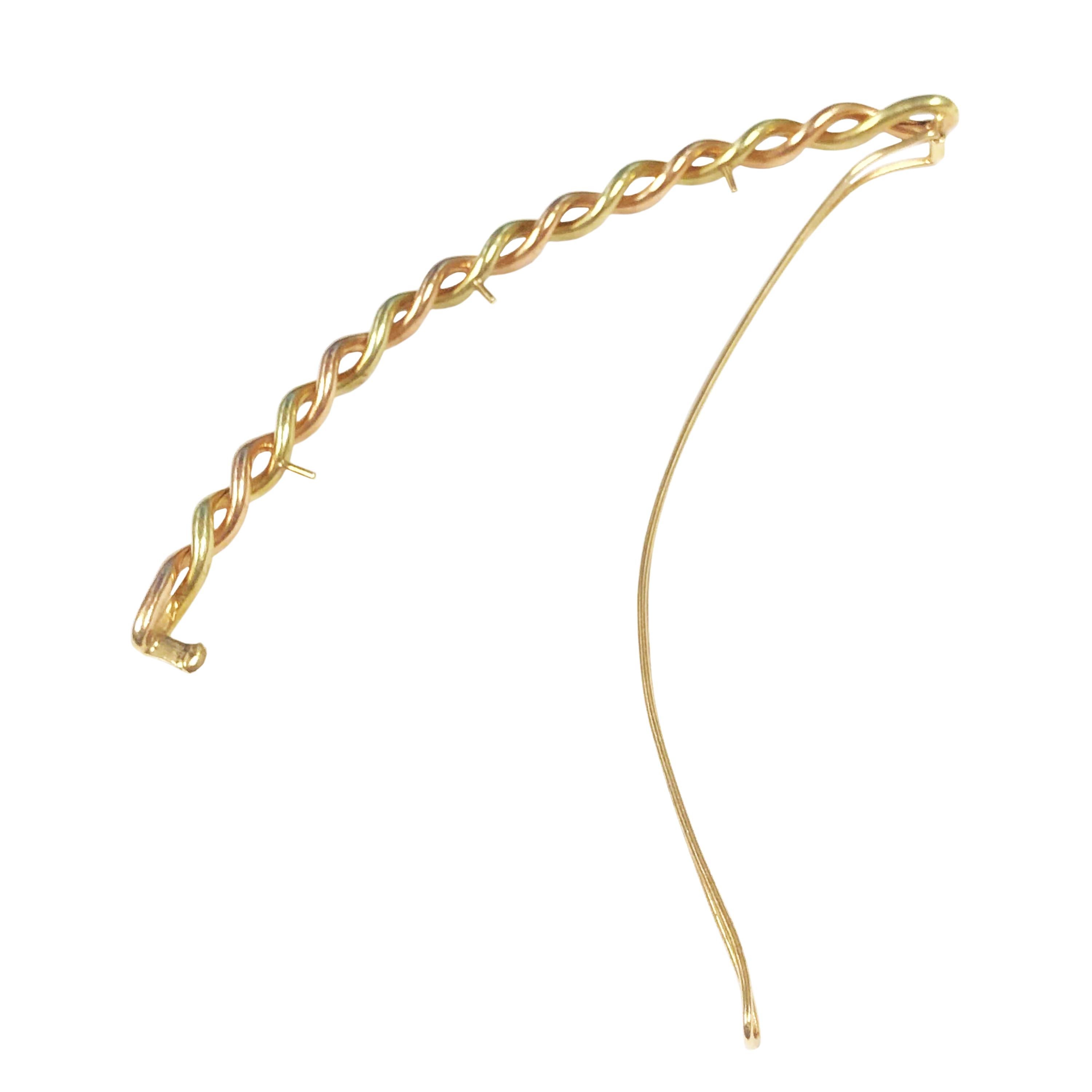Circa 1940s Cartier 14K Rose and Green Gold Hair Barrette, measuring 4 3/4 inches in length and 3/16 inch wide. having a tight snap closure, signed and numbered. 