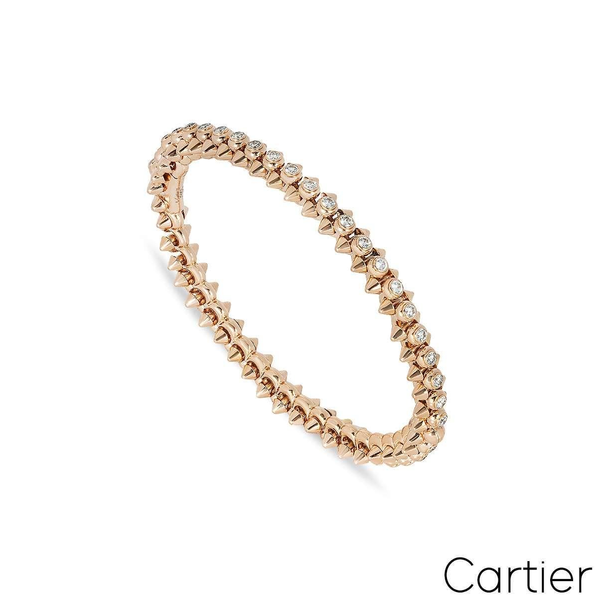 An 18k rose gold bracelet, from Cartier's Clash de Cartier collection. The bracelets design is composed of the centre being set throughout with 51 brilliant-cut diamonds totalling 1.51ct which are complemented by a stud design on either side.The