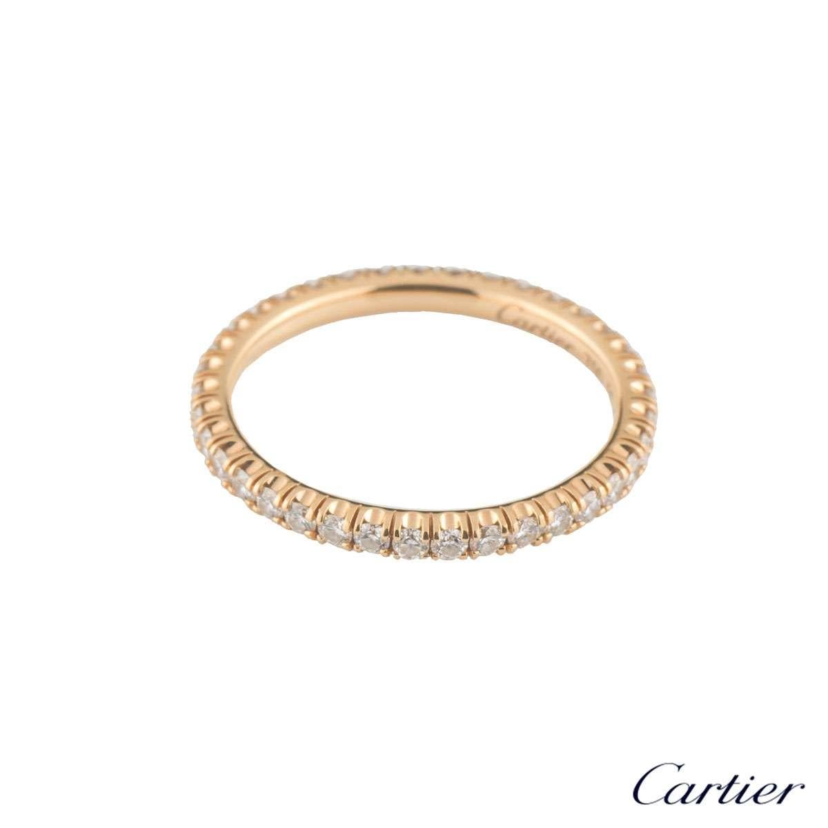 A beautiful 18k rose gold Cartier diamond ring from the Etincelle collection. The ring comprises of a full eternity of 37 round brilliant cut diamonds in a shared 4 claw setting all the way round. The diamonds have a total weight of 0.47ct, G+