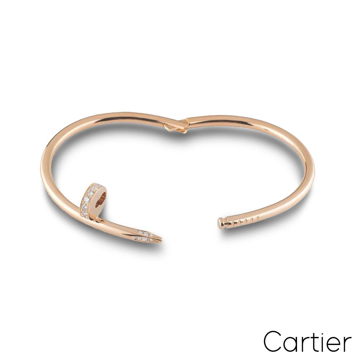 An iconic, 18k rose gold Cartier diamond bracelet from the Juste un Clou collection. The bracelet is in the style of a nail and features 27 round brilliant cut pave diamonds, set in the head and tip totalling 0.54ct. The diamonds are predominantly F
