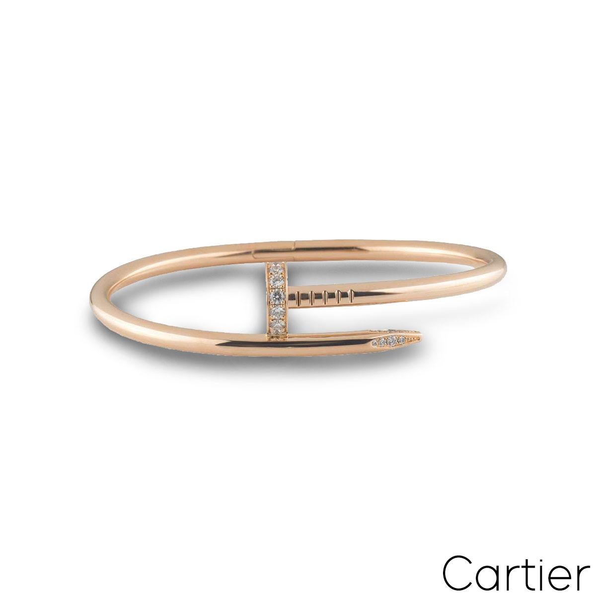 An iconic 18k rose gold Cartier diamond bracelet from the Juste Un Clou collection. The bracelet is in the style of a nail and has 27 round brilliant cut pave diamonds set in the head and tip, totalling 0.54ct. The diamonds are predominantly F