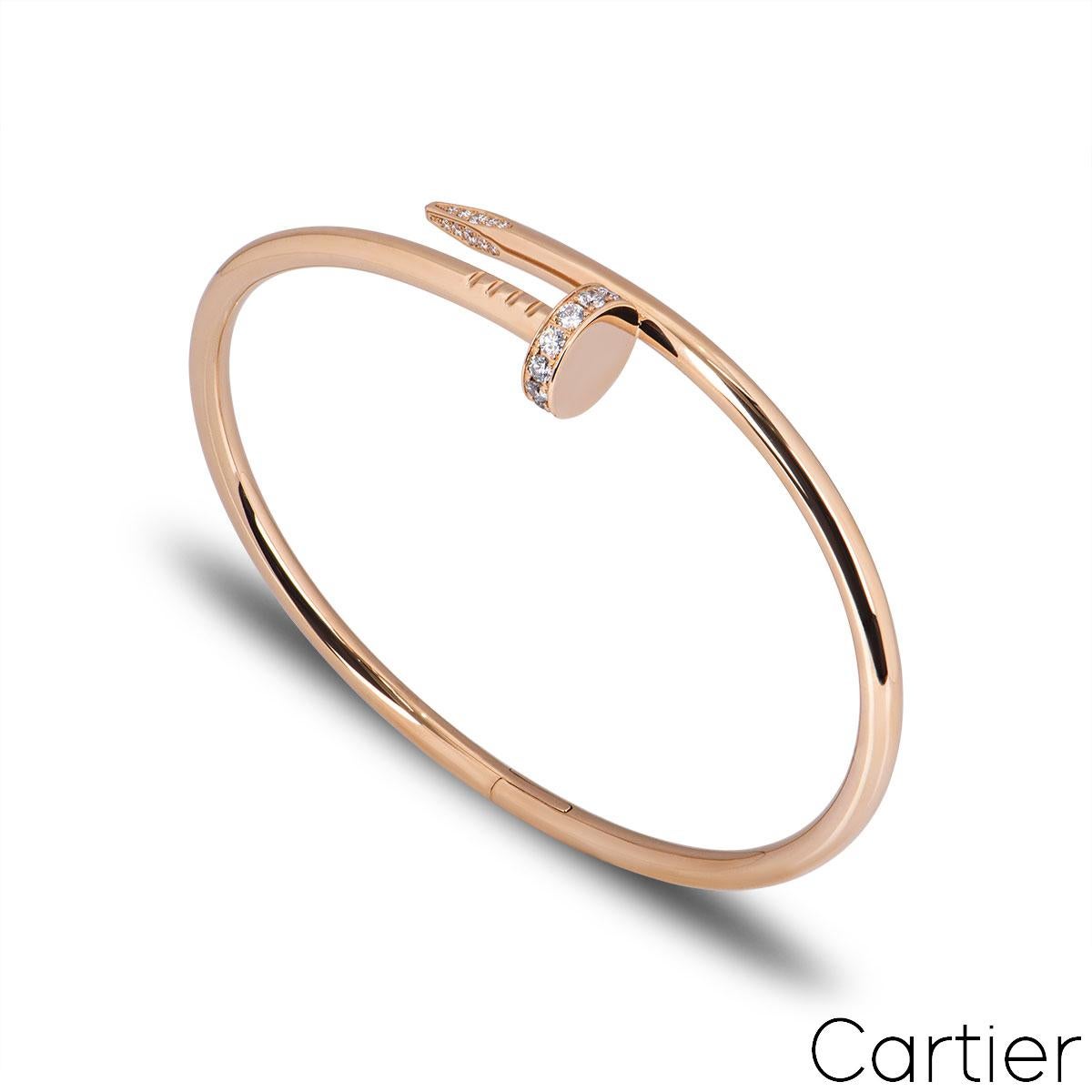 An 18k rose gold Cartier diamond bracelet from the Juste Un Clou collection. The bracelet is in the style of a nail and has 27 round brilliant cut pave diamonds set in the head and tip, totalling 0.54ct. The diamonds are predominantly F colour and