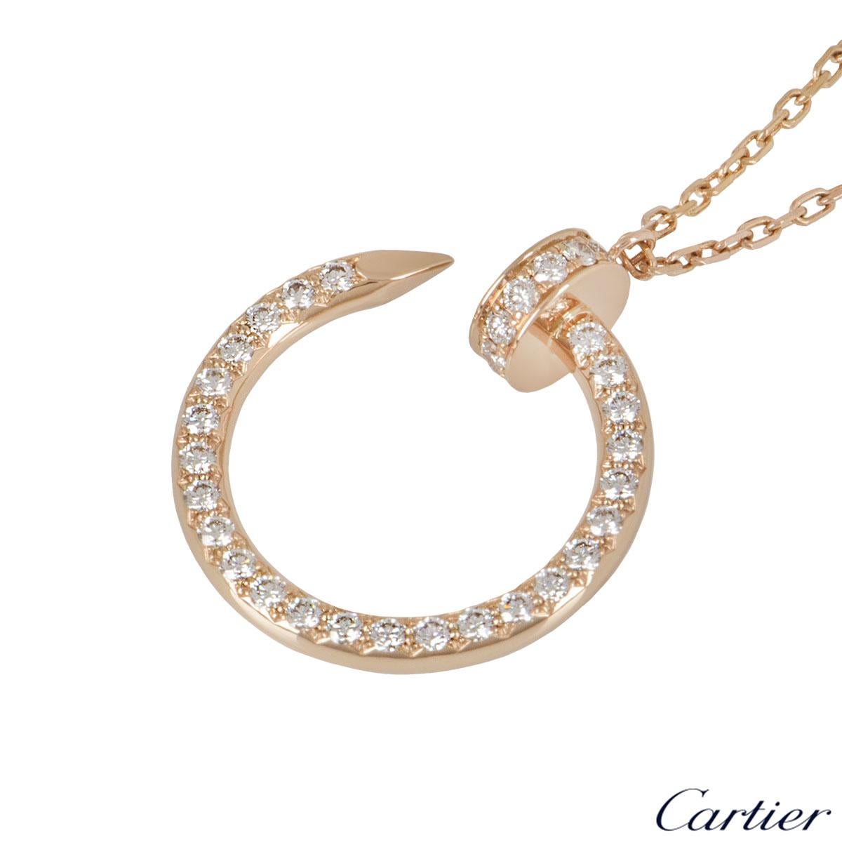 An 18k rose gold pendant by Cartier from the Juste Un Clou collection. The pendant is in the style of a nail pave set with 36 round brilliant cut diamond from the head to the tip. The diamonds have a weight of 0.38ct. The pendant features a lobster