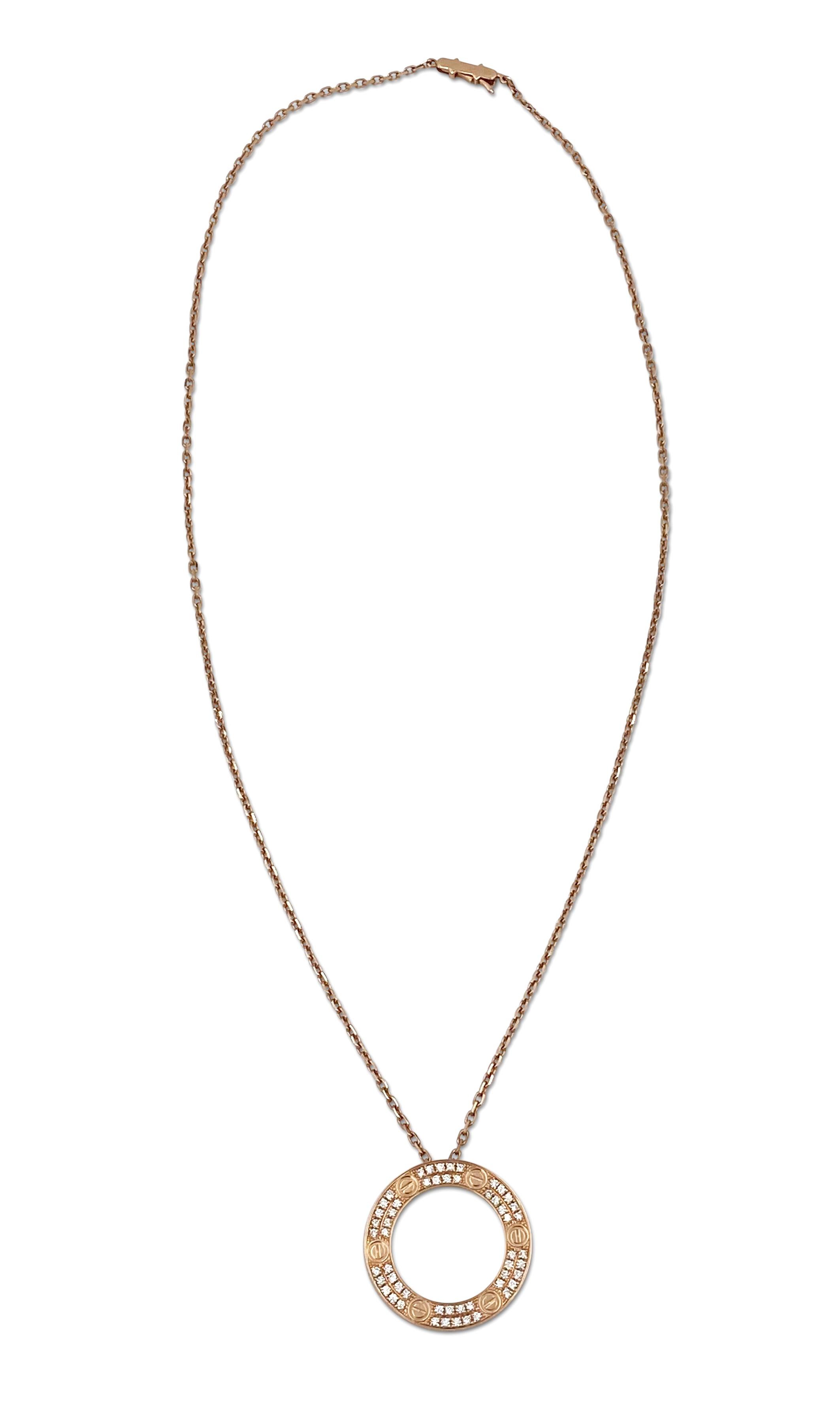Authentic chain and ring charm necklace from the Cartier Love collection. Made in 18 karat rose gold and oval link chain with a half inch round ring and screw top motifs set with round brilliant cut diamonds (F color, VS clarity) of approximately