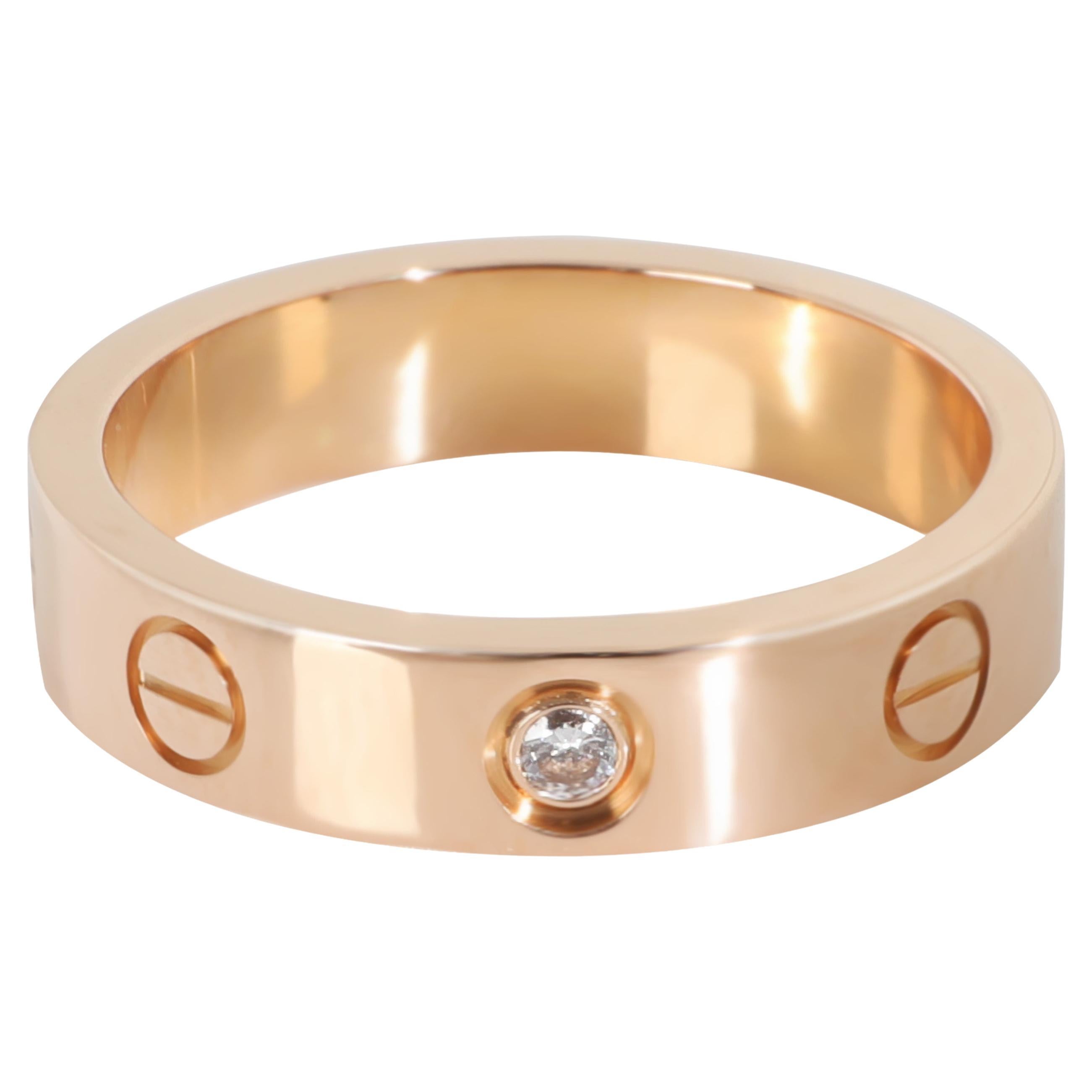 Bague Love en or rose à diamants et petit modèle de Cartier