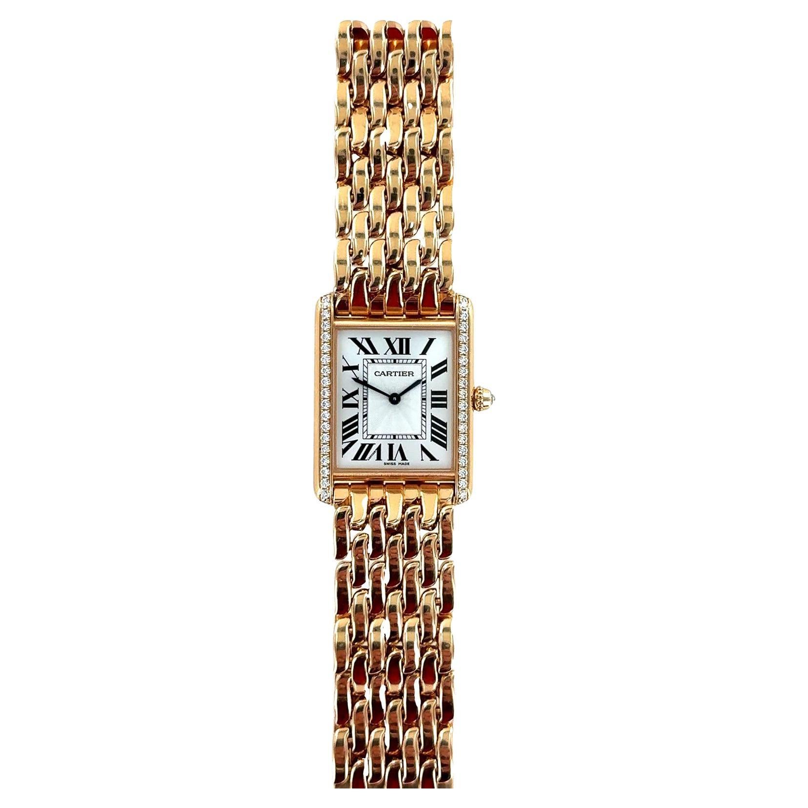 18 karat Rose Gold Tank Louis Cartier watch, large model, Manufacture mechanical movement with manual winding, caliber 1917 MC. Case in rose gold is set with 40 round brilliant-cut diamonds and beaded crown set with one brilliant-cut diamond of 0.65