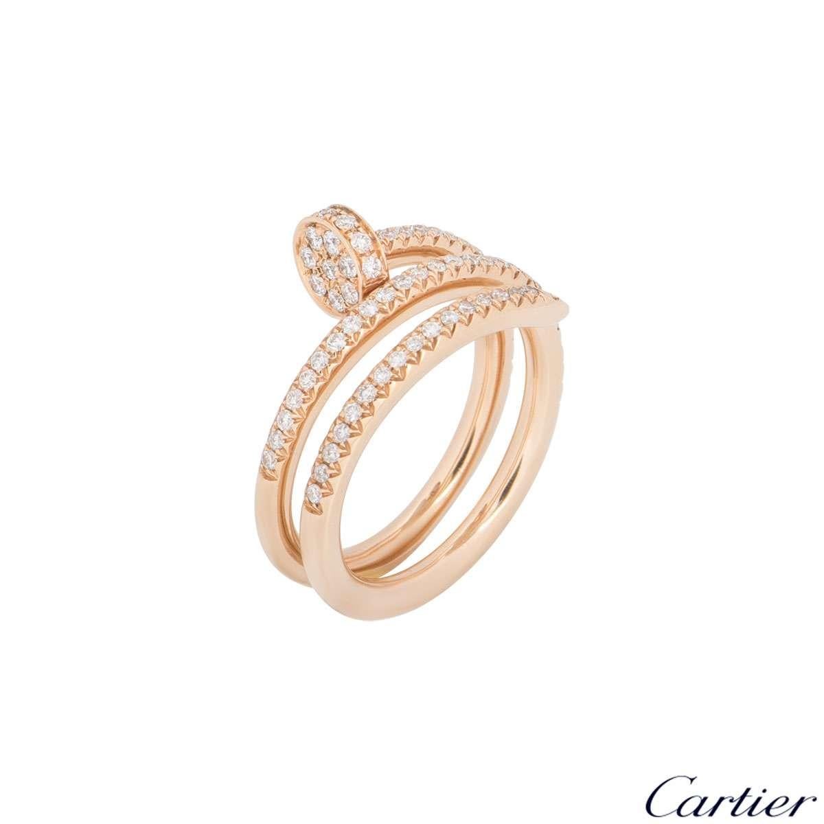 A new/unworn 18k rose gold Cartier diamond ring from the Juste Un Clou collection with complete box and papers. The ring is in the style of a nail wrapping around the finger and has 77 round brilliant cut diamonds pave set with a total weight of